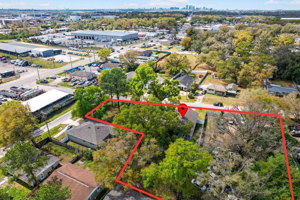 Virtually Staged. Positioned in the heart of Tampa Bay’s rapidly expanding commercial corridor, 2807 Locicero Drive offers a rare opportunity to acquire a high-visibility Commercial Mixed-Use property with exceptional flexibility and upside potential. Ideal for investors, developers, or owner-operators, this versatile site supports a wide range of permitted uses including professional office, medical, retail, boutique storefront, light industrial, distribution, or administrative headquarters. The property currently sits on a single parcel with preliminary potential for subdivision into three separate lots (subject to municipal approval), allowing for a central office or showroom complemented by two additional income-producing pads and multiple revenue streams.
Significant renovations have enhanced both functionality and curb appeal, creating a polished, residential-inspired aesthetic that makes the space welcoming for client-facing businesses or live/work concepts. The property features a 3-bedroom, 2-bath main layout plus an additional 1-bedroom, 1-bath suite, two full kitchens including a 2024 remodeled kitchen, spacious oversized rooms, walk-in showers in Baths 1 and 3, a tub in Bath 2, a 2023 roof and A/C system, and a metal shed for additional storage. Established parking, utilities, and site access support immediate operational readiness.
Strategically located near major transportation routes and key Tampa business districts, this property offers strong accessibility, logistical convenience, and excellent regional connectivity. Whether maintained as a single commercial asset or repositioned for multi-parcel development, 2807 Locicero Drive presents a compelling opportunity in one of Florida’s most dynamic growth markets. The seller is motivated and open to discussing terms tailored to buyer objectives. Contact the listing broker for zoning details, improvement information, and to schedule a private tour.
Additional 300 sq ft detached outbuilding featuring its own A/C, full bathroom, and kitchenette — perfect for a guest suite, home office, studio, gym, or private workspace.