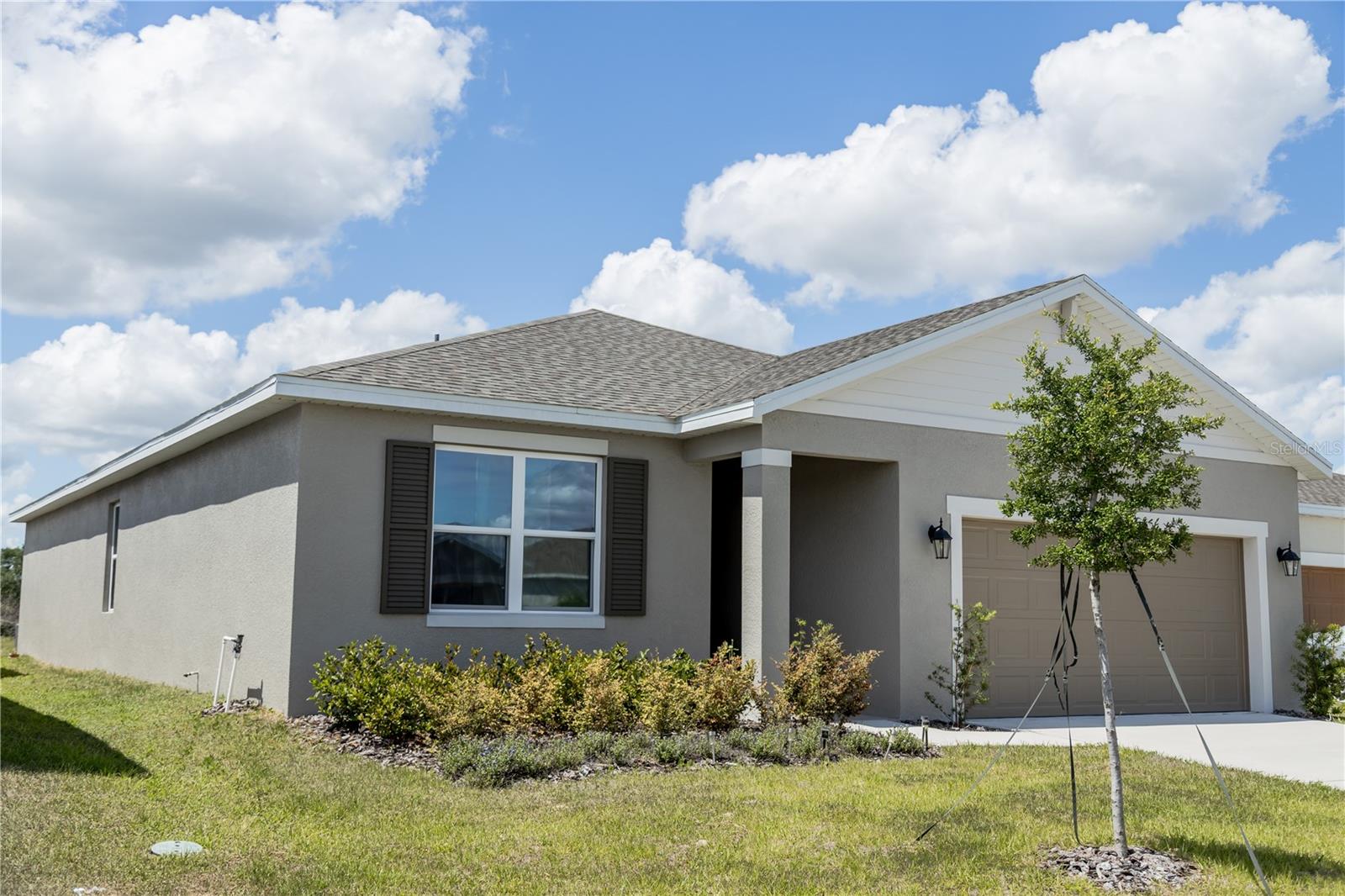 Welcome to 661 Crown Rose Blvd, a beautifully maintained 4-bedroom, 3-bathroom home offering over 2,000 square feet of comfortable living space in the growing Eagle Lake/Winter Haven area. This spacious layout is perfect for both everyday living and entertaining, featuring an open-concept design, generous bedrooms, and plenty of natural light throughout. The home offers a well-appointed kitchen that flows seamlessly into the main living and dining areas, creating an ideal space for gatherings. The primary suite provides a private retreat with ample space and an en-suite bath, while the additional bedrooms are perfect for family, guests, or a home office setup. Located in a rapidly developing area, this property is just minutes from AdventHealth facilities, a nearby gym, and a brand-new Target coming soon, along with exciting new retail and dining options. Enjoy the convenience of modern living while still being tucked into a quiet, residential community. Whether you’re looking for a primary residence or an investment opportunity, this home offers both value and location in one of Polk County’s fastest-growing areas. New pictures coming soon. Schedule your private showing today and take advantage of everything this home and location provide!