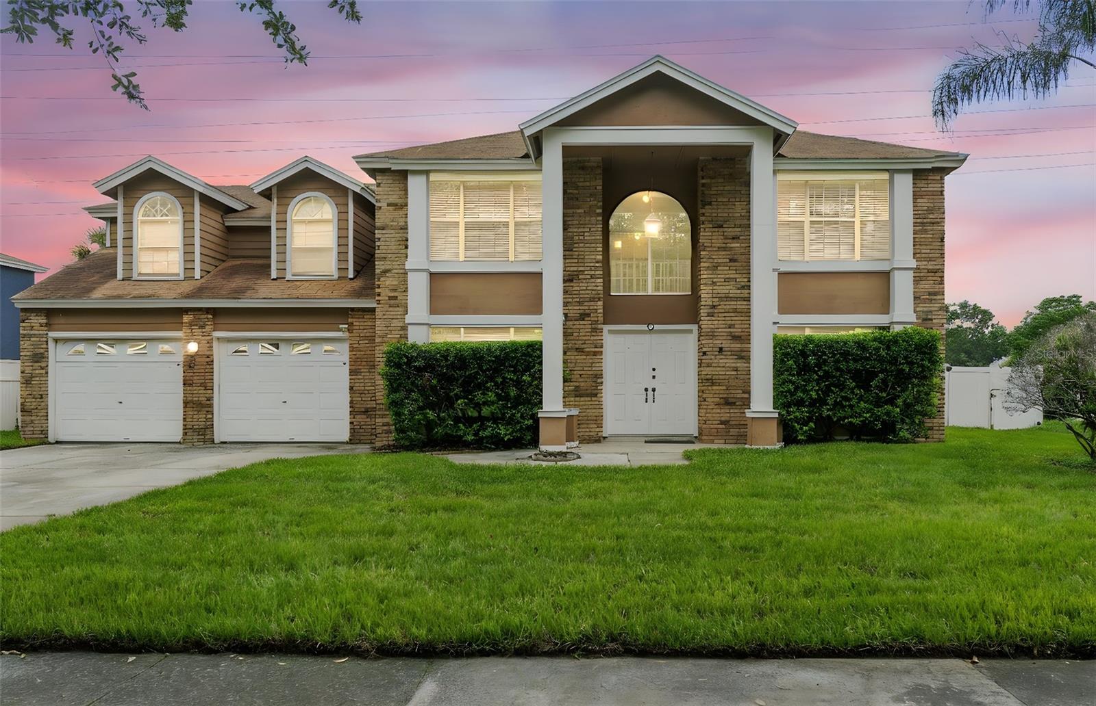 LOCATION LOCATION LOCATION!!!! This Dr. Phillips Executive gem zoned to one of the Best school districts in Orange County features upgrades throughout including new carpet, repainted interior, resurfaced pool, a new energy efficient water heater, tile throughout the first floor, granite counter tops in the kitchen, and much more! This amazing 4-bedroom, 2.5-bathroom home features a separate den, formal dining room, family room with fireplace, kitchen, eat-in breakfast nook, laundry room and a half bath downstairs. Upstairs you’ll find a spacious master suite with an oversize master bathroom and dual closets. Upstairs you’ll also find three spacious secondary bedrooms (two with walk-in closets) and a 2nd full bath. The back yard features a large screened in pool with ample backyard left over for a game of catch or for man’s best friend to run around. This home is close to all the action and within minutes of some of Orlando’s most famous residents, including a boy named Harry and his magic wand. Within just a few minutes' drive of this home, you will find plenty of shopping, such as Millenia Mall, Premium Outlets, Universal Studios, Disney Parks, Fine Dining and much more!! You will love to call this home!