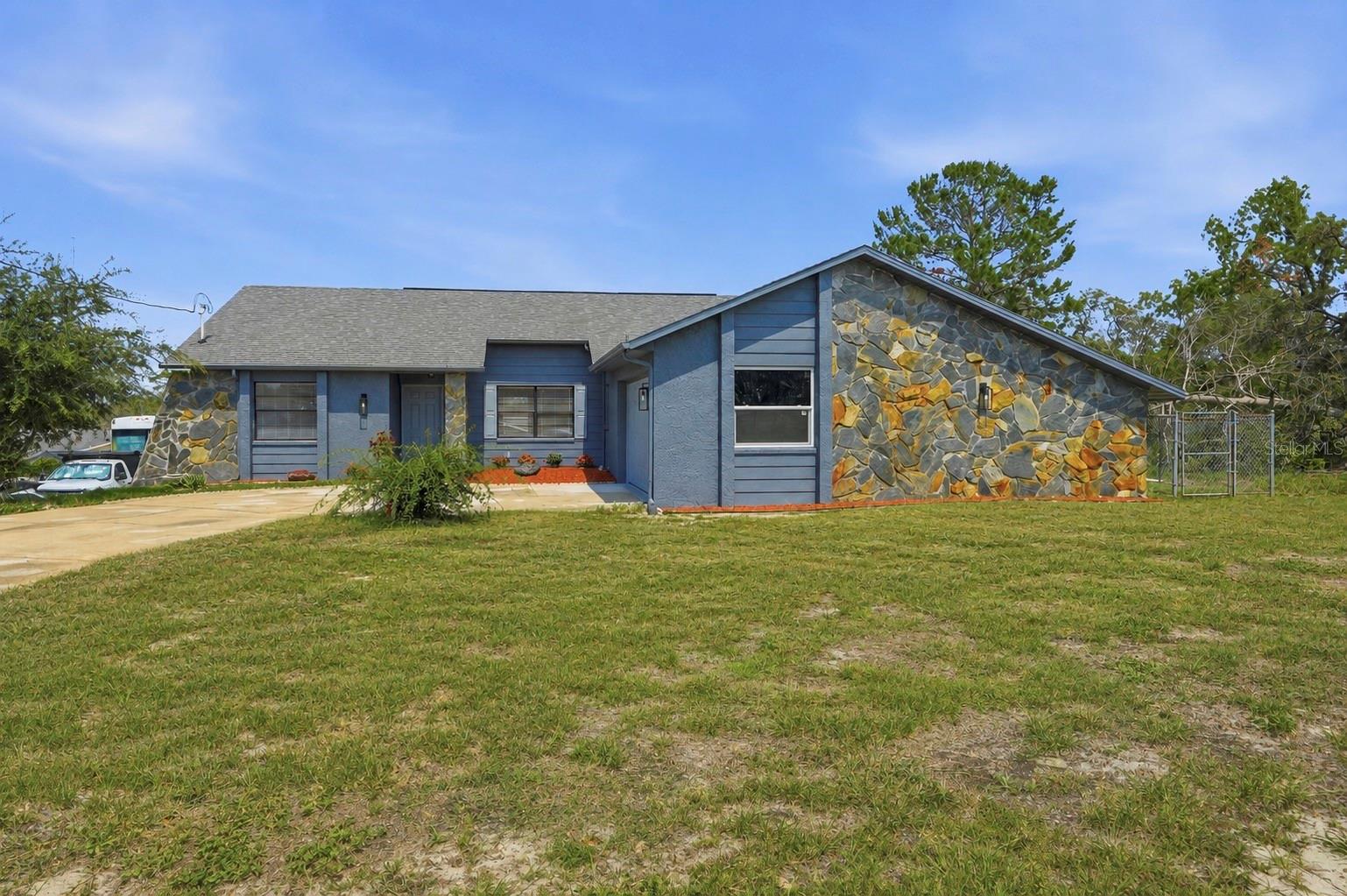 6426 July Avenue, Spring Hill, FL 34608 – Welcome to this beautifully remodeled 3-bedroom, 2-bath pool home that is truly move-in ready! From the moment you step inside, you’ll appreciate the bright, open floor plan designed for comfortable living and effortless entertaining.

This stunning home has been extensively updated, offering peace of mind with a new roof, new air conditioning system, and new hot water heater. The interior features luxury vinyl plank flooring throughout, creating a seamless and modern look that complements any décor.

The spacious living area is highlighted by a charming fireplace, adding warmth and character to the heart of the home. The open-concept design flows effortlessly into the kitchen and dining areas, making it ideal for gatherings with family and friends.

Step outside to your private backyard retreat featuring a refinished in-ground pool and a large screened pool enclosure, perfect for enjoying Florida’s year-round sunshine while relaxing or entertaining guests.

Conveniently located near shopping, dining, medical facilities, parks, schools, and major roadways, this home offers the perfect combination of comfort, style, and accessibility.

If you’re looking for a turnkey home with major updates already completed, 6426 July Avenue is a must-see. Schedule your private showing today and experience everything this exceptional Spring Hill pool home has to offer!