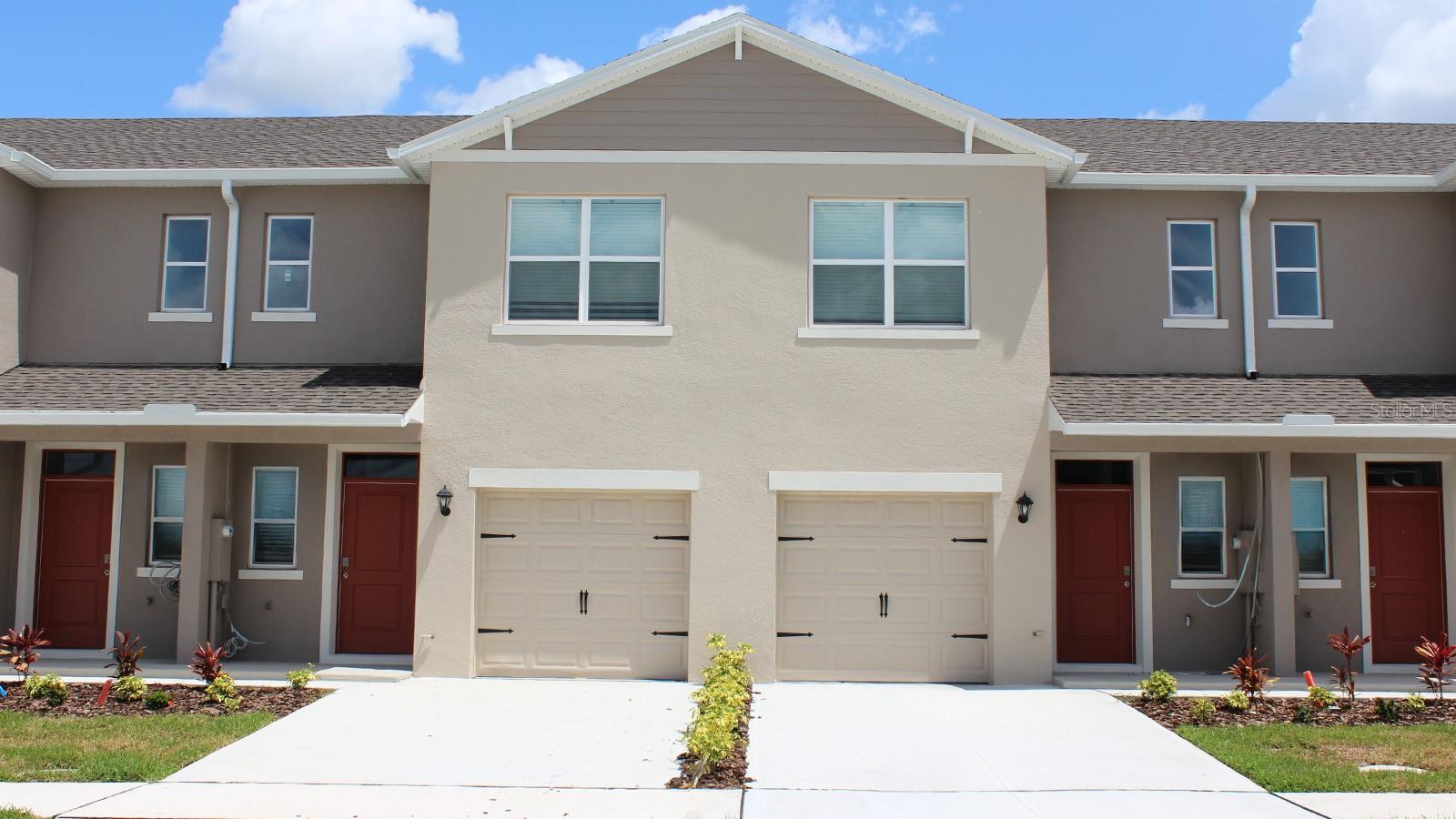 Under Construction. Introducing the Pearson – where modern elegance meets everyday functionality in this stylish townhome. Located in Hawthorne Ranch in Lakeland, Florida. Step into sophistication as you enter through the one-car garage into a spacious and welcoming abode with 1,463 square feet.

The heart of the home, a sprawling living space, beckons with its ample room and abundant natural light. Whether entertaining guests or enjoying a quiet night in, this versatile area adapts effortlessly to your lifestyle needs. Adjacent to the living space lies the dining nook and gourmet kitchen, a chef's delight adorned with sleek cabinetry, premium stainless-steel appliances, and a stunning center island. Gather around the island for casual meals or culinary adventures, as the kitchen effortlessly blends style with functionality.

Upstairs, three comfortable bedrooms await, providing space for rest and relaxation. The primary bedroom offers a peaceful retreat, complete with a walk-in closet and a luxurious ensuite bath featuring dual sinks, and walk-in shower. With 2 1/2 baths throughout the home, convenience is never far away. Whether getting ready for the day or unwinding in the evening, you'll appreciate the thoughtful design and attention to detail in every corner of the Pearson.

Like all homes in Hawthorne Ranch, the Pearson includes all concrete block and also smart home technology, which allows you to control your home anytime with your smart device while near or away.

Experience the ultimate in modern living with this thoughtfully designed townhome, where comfort and style converge to create the perfect sanctuary for you and your loved ones. Welcome home to the Pearson – where every day is an invitation to live life to the fullest. Schedule a tour today in Hawthorne Ranch.
*Photos are of similar model but not that of the exact house. Pictures, photographs, colors, features, and sizes are for illustration purposes only and will vary from the homes as built. Home and community information including pricing, included features, terms, availability, and amenities are subject to change and prior sale at any time without notice or obligation. Please note that no representations or warranties are made regarding school districts or school assignments; you should conduct your own investigation regarding current and future schools and school boundaries.*