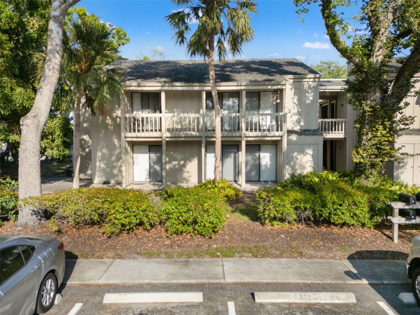 Location truly makes all the difference—and this one delivers. Welcome to Cordova Gardens, a charming and peaceful community surrounded by lush, mature landscaping and ideally situated in the heart of Sarasota. Just minutes from the area’s world-renowned beaches, vibrant downtown, and iconic St. Armands Circle, you’ll have effortless access to boutique shopping, top-rated restaurants, Sarasota Memorial Hospital, art galleries, local theaters, Selby Gardens, and everything that makes this coastal lifestyle so special.

This spacious ground-floor 2-bedroom, 2-bath condo offers both comfort and convenience with an inviting open-concept living and dining area, perfect for relaxing or entertaining. Ceramic tile flooring runs throughout, creating a clean, cohesive look, while the kitchen is equipped with stainless steel appliances and a convenient stacked washer and dryer.

Natural light fills the home, enhanced by multiple sliding glass doors that invite in warm Florida sunshine and gentle tropical breezes. Step outside to your screened-in lanai and two private outdoor patios—ideal for enjoying a quiet morning coffee or unwinding with evening refreshments.

Cordova Gardens residents enjoy a variety of amenities, including a welcoming clubhouse, a heated community pool, assigned parking, ample guest parking, and covered bike storage. With maintenance-free living, you can spend less time on upkeep and more time enjoying everything Sarasota has to offer.