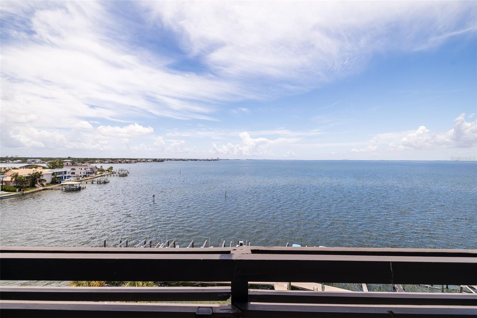 Rare double-unit waterfront condominium with two boat slips available and panoramic views of Tampa Bay. A once-in-a-lifetime opportunity to own the only double-unit residence in the building. Offering over 3,400 square feet of living space and nearly 800 square feet of balcony space, this exceptional waterfront home features breathtaking open Tampa Bay views from virtually every room. Every bedroom and living area has access to its private balcony, creating a seamless indoor-outdoor living experience. This spacious residence includes a private boat slip and has been thoughtfully updated with one new air conditioning system and hurricane-impact windows throughout. The building has also completed significant improvements, including a new seawall, relined plumbing pipes, exterior restoration in 2025 and a newer 2023 roof, providing peace of mind for years to come.  Ideally just five minutes from Tampa International Airport, minutes from the Howard Frankland Bridge, Veterans Expressway, and Interstate 275, and only 15 minutes from downtown Tampa. This is a unique waterfront property combining unmatched space, spectacular views, boating access and an unbeatable Tampa location.