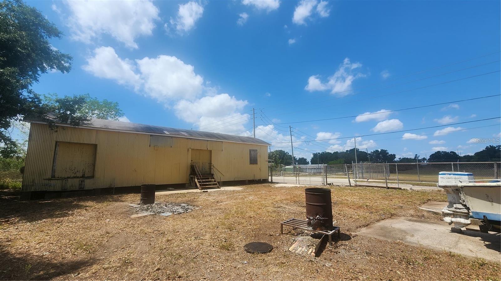Discover the potential of this gated industrial property, perfectly situated on a corner lot in the heart of Historic Lake Wales. Located just minutes from Downtown Lake Wales and near a Major Industrial Plant, this property offers a strategic location with easy access to major routes and business hubs. Its prime location in an area undergoing exciting revitalization makes it an exceptional investment opportunity. With ongoing development efforts breathing new life into the historic district, this space is ideal for businesses looking to establish themselves in a growing and evolving market. Schedule an appointment today!