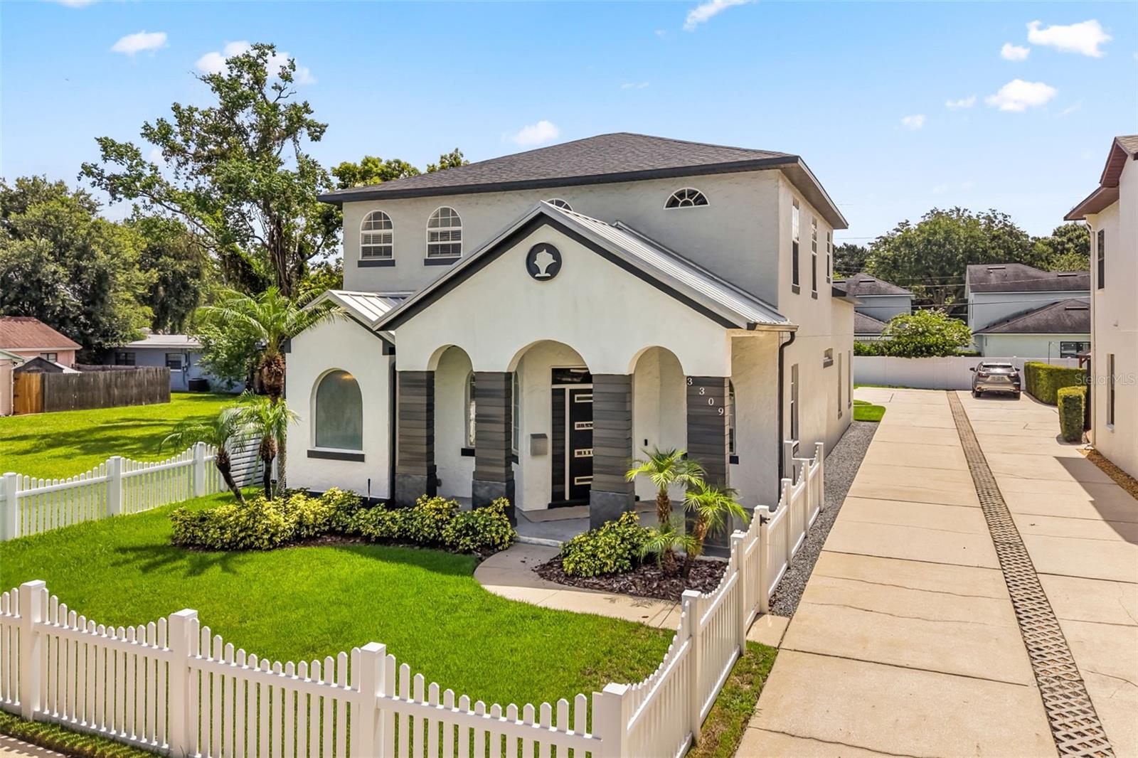 Beautifully updated 4-bed, 2.5-bath home on one of College Park’s most desirable streets. Built in 2005 and fully renovated in 2021, this property blends modern comfort with timeless charm. A white picket fence and spacious front porch create an inviting first impression.

Inside, the foyer opens to soaring two-story ceilings that fill the home with natural light. The dining room sits just off the entry, and the kitchen flows seamlessly into the living room for easy entertaining. Double French doors lead to the screened backyard with an in-ground spa and screened-in patio. The spa is heated by natural gas.

The first-floor primary suite offers a peaceful retreat with its own set of French doors to the patio. The ensuite includes a large walk-in closet with custom shelving, soaking tub, separate shower, and dual vanities. Upstairs are three additional bedrooms and a full bath. The A/C was replaced in 2024

A detached 2-car garage sits at the rear of the property, providing excellent storage and parking. This move-in-ready home delivers College Park living at its best. This home is available immediately.
