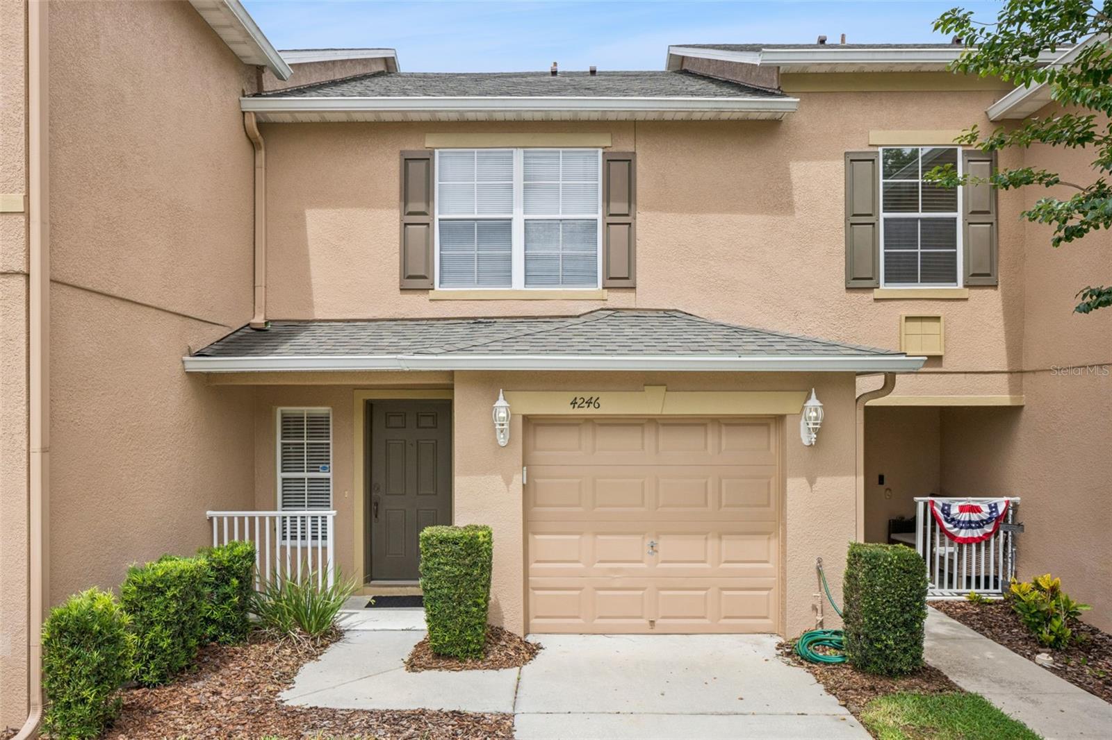 Welcome to this beautifully maintained 2-bedroom, 2.5-bath townhome in the desirable Hawthorne Glen community, conveniently located just 1 mile from the University of Central Florida (UCF). Enjoy the ultimate college-town lifestyle—ride your bicycle to campus or cheer on the Knights at home games with ease!

This spacious home features a 1-car garage and an open-concept floor plan designed for comfortable living and entertaining. The kitchen offers a side-by-side stainless steel refrigerator, breakfast bar with seating for four, pantry, abundant cabinet space, and overlooks the family and dining areas. Luxury vinyl plank flooring runs throughout the entire downstairs, creating a modern, low-maintenance living space. A convenient first-floor powder room with a pedestal sink is perfect for guests.

Upstairs, you'll find two generously sized primary suites, each with its own private en suite bathroom and spacious closets, providing privacy and flexibility for roommates, guests, or a home office. The upstairs laundry room includes a GE top-load washer and dryer for added convenience.

Recent updates include a new water heater (2025) and a newer roof (2022), offering peace of mind for years to come.

The low HOA fee includes access to the community pool and playground, making this an excellent primary residence or investment opportunity in one of East Orlando's most convenient locations. Close to UCF, shopping, dining, major highways, and everything the area has to offer—don't miss your chance to own this move-in-ready townhome!