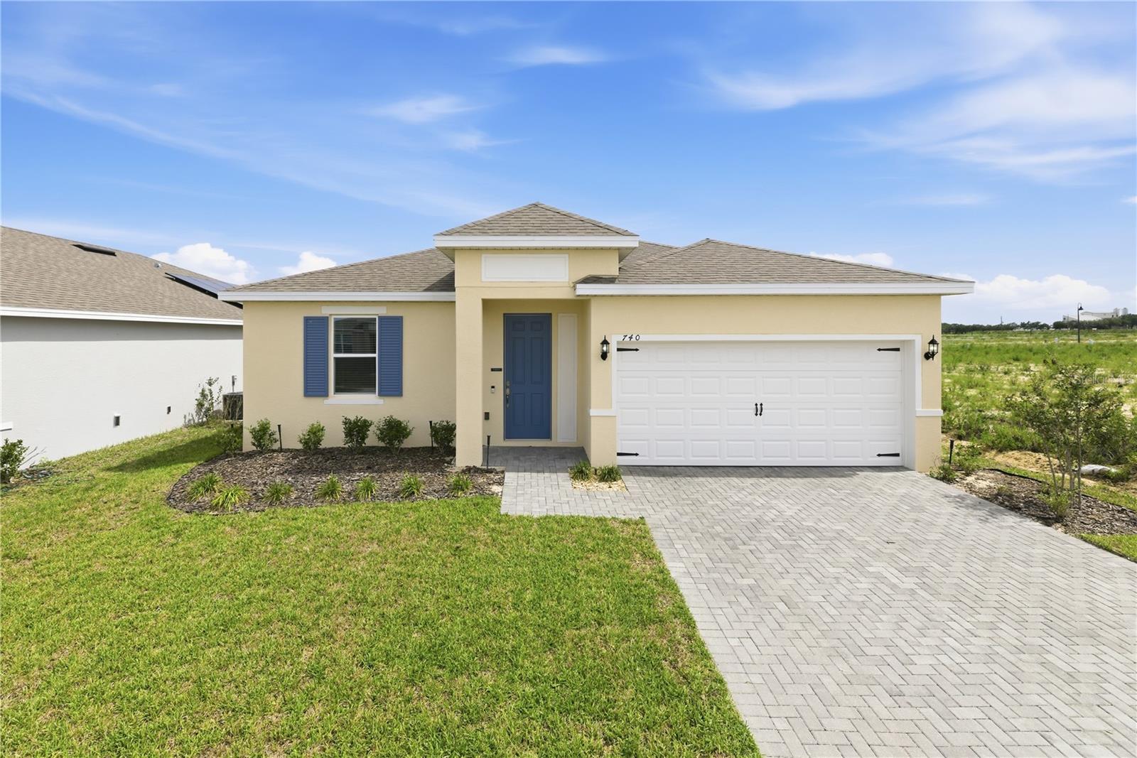 Welcome to this beautiful 3-bedroom, 2-bath home with a 2-car garage in the sought-after Tarpon Bay community. Showcasing a modern design and open-concept layout, this home offers comfort, style, and the perfect setting for everyday living and entertaining.

The spacious kitchen is the heart of the home, featuring granite countertops, stainless steel appliances, ample cabinetry, and a large center island overlooking the living and dining areas—ideal for gatherings with family and friends. The cozy yet inviting living space is filled with natural light, creating a warm and welcoming atmosphere.

The primary suite offers a generous walk-in closet and a private en-suite bath providing a relaxing retreat at the end of the day. A spacious interior laundry room includes a washer and dryer, adding convenience and functionality.

Residents enjoy resort-style amenities, including a sparkling community pool, cabana, and dog park—perfect for embracing the Florida lifestyle. Conveniently located near top-rated schools, Advent Health Heart of Florida Hospital, shopping, dining, and everyday essentials. With easy access to Hwy 27 and I-4, commuting is effortless, and Walt Disney World and other major attractions are just a short drive away.