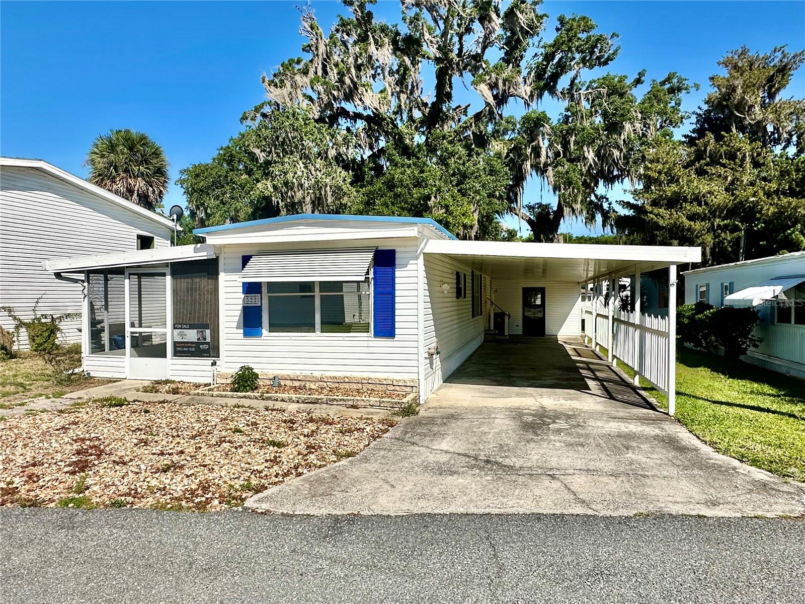 Welcome to this well-maintained 2-bedroom, 2-bath mobile home located in Leesburg within the desirable 55+ community of Bonfire Mobile Village. This home features laminate flooring throughout the main living areas, kitchen, and dining space, creating a clean and cohesive feel. The updated kitchen offers upgraded cabinetry along with stainless steel appliances including a refrigerator, range, microwave, and Frigidaire dishwasher.

Enjoy additional living space in the screened-in Florida room with ceramic tile flooring — the perfect place to relax and enjoy Florida’s year-round sunshine. The home also features electric heat, a newer electric water heater, and a covered outdoor laundry and workshop area for added convenience and storage.

Outside, the property offers a tandem two-car covered carport and low-maintenance living in an active community setting. Residents of Bonfire Mobile Village enjoy amenities including a community swimming pool, library, laundromat, and a welcoming neighborhood atmosphere, all conveniently located near shopping, dining, medical facilities, and the many recreational opportunities that make Central Florida living so desirable.