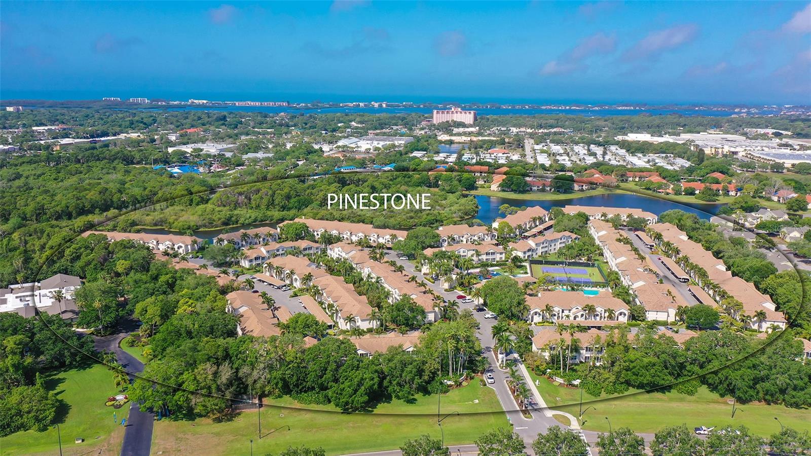 Palmer Ranch condo close to Siesta Key and Legacy bike/walking trail. Chateau model is largest floor plan with 1604 square feet, soaring two story ceilings, spacious master bedroom suite. This open airy condo lives more like a house. Generous closet space and storage. Updated AC, updated appliances. Ceramic tile in main living area. Master bedroom new carpet August 2025. Entire unit painted 2022. This unit is very clean, move in condition. Gated community community with junior olympic sized heated pool and hot tup/spa. Lighted tennis and pickle ball courts, basketball, court, bicycle stands, BBQ/picnic area. Clubhouse includes fitness center, billard and card rooms, library and private 32 seat movie thertre. Pinestone is 1/2 mile to Sarasota Square Mall, Costco, YMCA and dining.