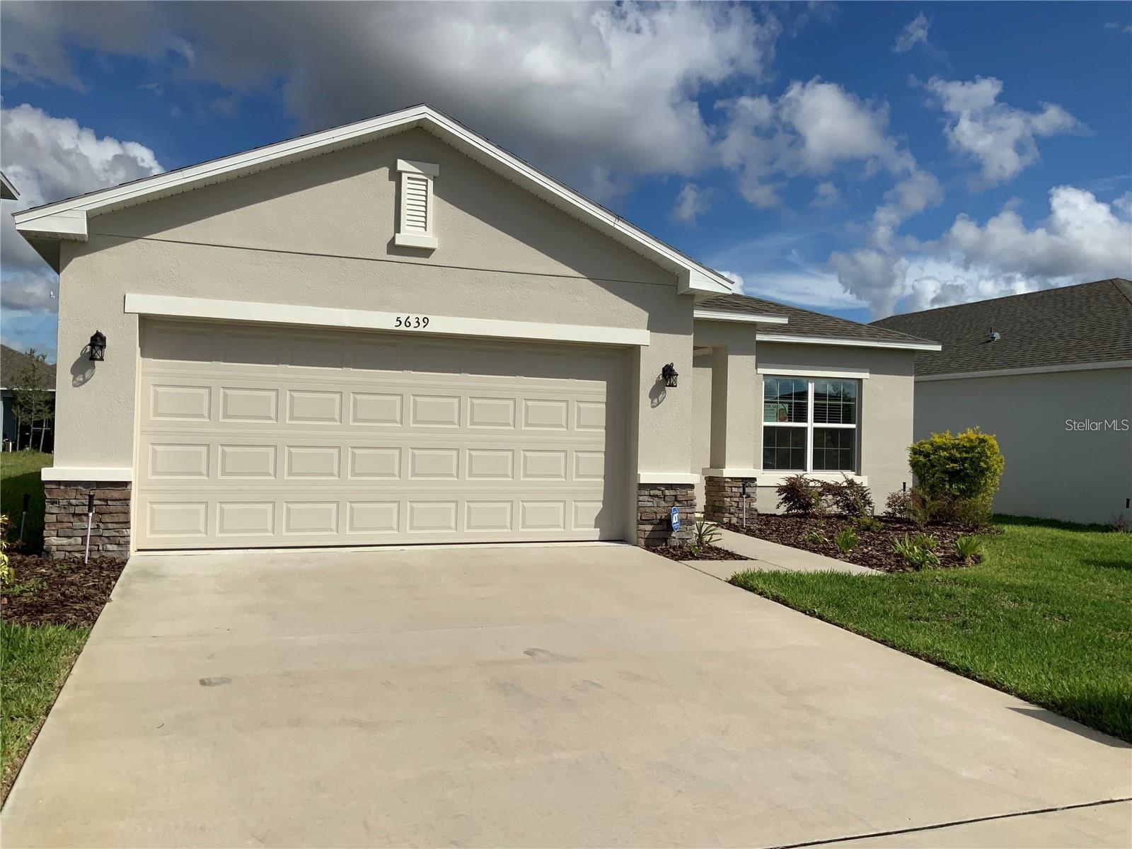 Brand new fence installed July of 2026! Now is the time to schedule your showing of this Disney World area home with 3 bedrooms, 2 bathrooms and a 2 car garage in a community including a community pool, playground, sidewalks, secured mailboxes and a low HOA of only $99 a month! Location! Location! Location! Disney is only 10 miles away! Shopping, restaurants and main highways are all close by! Bella Citta Elementary K-8 school is in biking distance from this home! Publix shopping center is right across the street from the school with a sushi restaurant, a pizza place, a nail salon, a pool supply company, dental care at Champions Crossings which is the name of this Publix shopping center…and so much more. This is located off highway 27 and I-4 exit 55 as well as 192 and 429. We have state-of-the art hospitals and various different churches in the area. This home is priced to sell today! Call and make your dreams come true today and enjoy everything Central Florida has to show!
