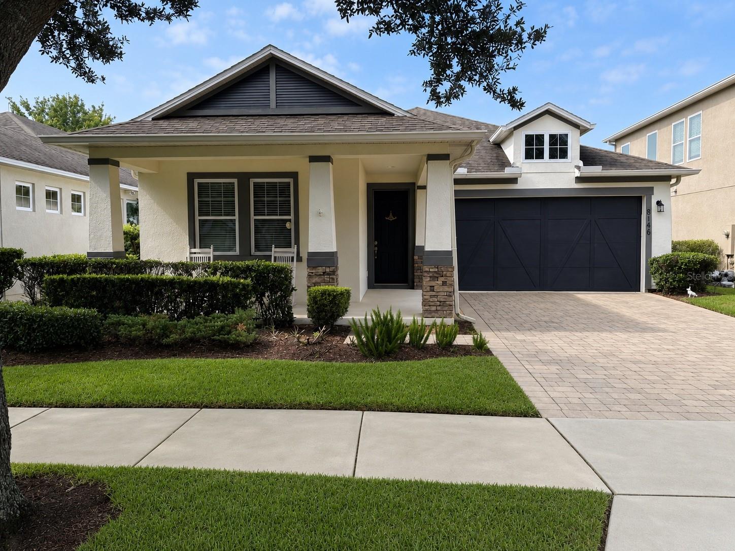 Listed below recent appraisal! Welcome to this beautifully maintained Ashton Woods built, single-story home in the highly sought-after Reserve at Berkshire Park in Windermere, Florida. Used primarily as a second home since it was built, this move-in-ready 3-bedroom, 2-bath residence has seen only light seasonal use and offers exceptional pride of ownership, showing like new.

Situated on a premium pond-front homesite with tranquil conservation views, you'll also enjoy the magical bonus of nightly Disney fireworks from your covered lanai. This thoughtfully designed split-bedroom layout offers an open-concept living space bathed in natural light, highlighted by a generous great room, a cheerful café-style dining area, and a stylish kitchen featuring rich espresso cabinetry, quartz countertops, a stacked-stone backsplash, and plenty of room for both everyday living and entertaining.

Additional highlights include generously sized secondary bedrooms, a spacious two-car garage, beautifully maintained landscaping, and added peace of mind with an HVAC system installed in 2021, featuring a recently replaced compressor.

Residents of the Reserve at Berkshire Park enjoy low HOA fees, a community pool, and access to highly rated Orange County schools. Conveniently located just minutes from Walt Disney World, Horizon West, shopping, dining, and major highways, this exceptional home offers the perfect combination of location, lifestyle, and value in one of Windermere's most desirable communities.
