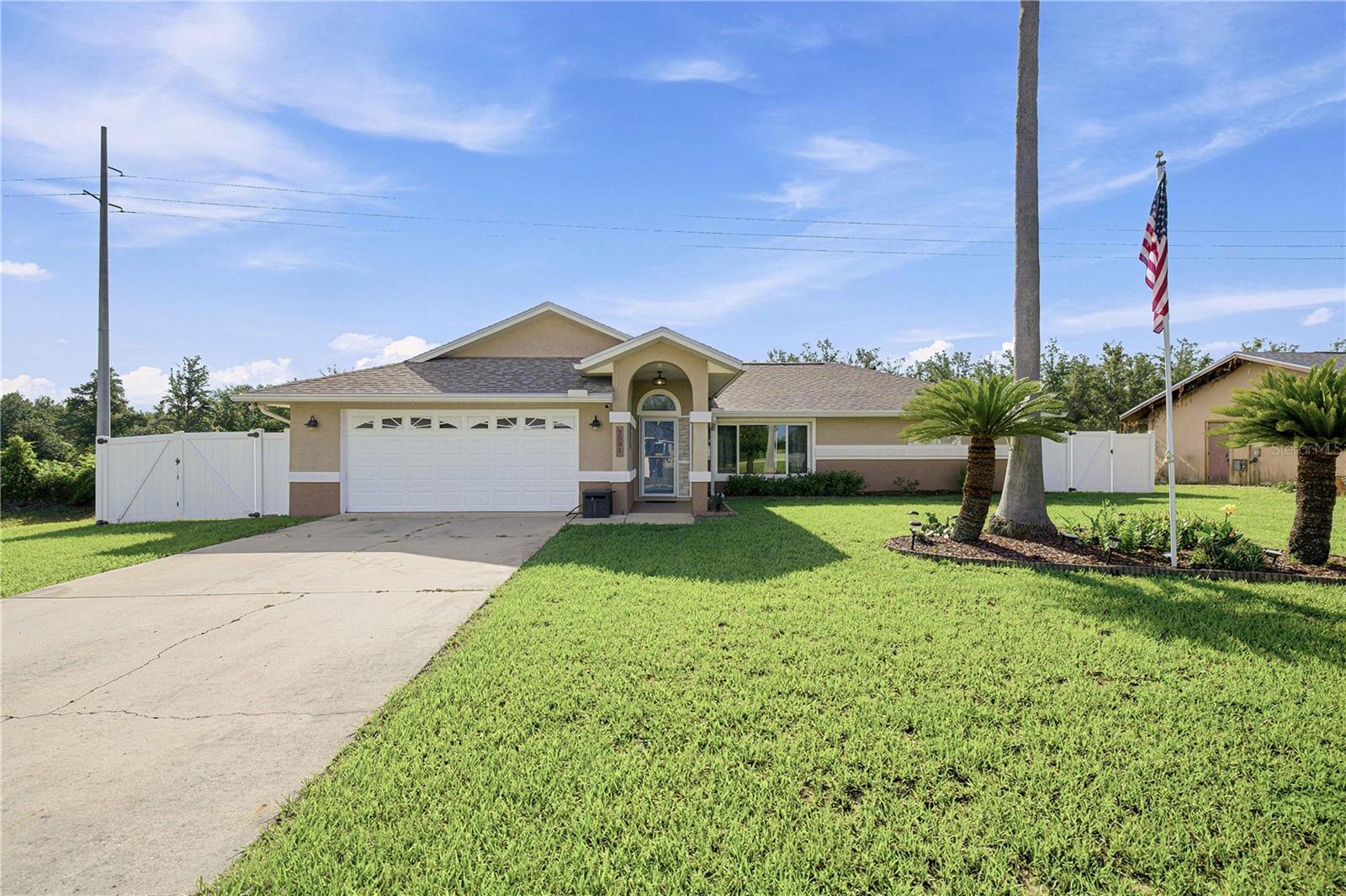 Welcome to this beautifully maintained 3-bedroom, 2-bath pool home** offering the perfect blend of comfort, space and privacy. Step inside to an updated kitchen featuring stainless steel appliances, modern finishes and a functional layout that's perfect for everyday living and entertaining. Designed with space in mind, the home features both a formal living room and a separate family room, providing plenty of room to relax, entertain, or gather with family and friends. Step outside to your own backyard oasis featuring a sparkling pool, a fully fenced backyard, no rear neighbors, and no neighbors to the left, offering exceptional privacy and a peaceful setting. Additional highlights include a new roof installed in 2023 and a spacious 2-car garage, providing ample room for vehicles, storage, or hobbies. Whether you're enjoying quiet evenings by the pool or hosting guests, this home is designed for comfortable Florida living. Don't miss your opportunity to own this move-in-ready home with desirable upgrades and exceptional privacy.