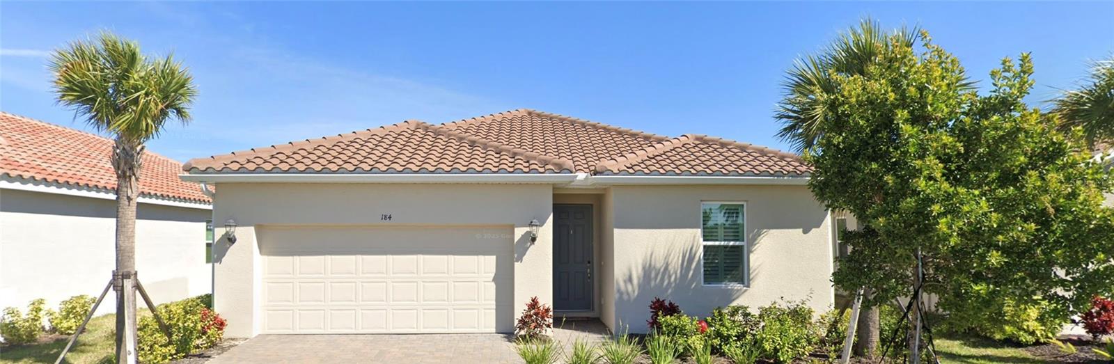 Welcome to 184 Daylily Boulevard, a beautifully maintained home located in the highly desirable gated community of Venice Woodlands in Nokomis. Combining modern comfort, resort-style amenities, and an exceptional location, this residence offers the perfect opportunity to enjoy the best of Florida living.

Step inside and discover a thoughtfully designed floor plan featuring bright, open living spaces ideal for both everyday living and entertaining. Large windows invite natural light throughout the home, creating a warm and welcoming atmosphere. Whether hosting family and friends or enjoying a quiet evening at home, this residence offers comfort, functionality, and style.

Venice Woodlands is a sought-after gated community known for its beautifully landscaped surroundings and impressive amenities. Residents enjoy access to a resort-style swimming pool, fitness center, clubhouse, pickleball courts, bocce ball courts, and walking paths throughout the neighborhood. The community provides a vibrant yet peaceful lifestyle with opportunities to stay active and connected.

One of the property's greatest advantages is its prime location. Just minutes away, you'll find the pristine Gulf beaches of Nokomis Beach and Venice Beach, where you can enjoy swimming, boating, fishing, paddleboarding, and spectacular sunsets. Outdoor enthusiasts will appreciate easy access to the renowned Legacy Trail, perfect for biking, walking, and jogging.

Nearby attractions include historic downtown Venice, known for its charming boutiques, outdoor cafés, waterfront dining, farmers markets, and year-round community events. Golf enthusiasts will find numerous championship golf courses nearby, while nature lovers can explore Oscar Scherer State Park, Casey Key, and the area's many parks, preserves, and waterways.

Conveniently located near shopping, dining, medical facilities, and major roadways, this home offers easy access to Sarasota, Venice, and all that Florida's Gulf Coast has to offer.

Whether you're searching for a year-round residence, seasonal retreat, or investment opportunity, 184 Daylily Boulevard offers the perfect combination of location, lifestyle, and community amenities. Schedule your private showing today and experience the Venice Woodlands lifestyle for yourself.
