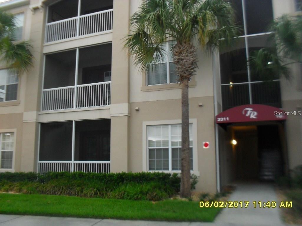 BACK ON THE MARKET!  REDUCED RENT!  BEAUTIFUL & SPACIOUS 1ST FLOOR CONDO IN GATED COMMUNITY- FLORA RIDGE CONDOMINIUM IN KISSIMMEE, STEPS TO THE COMMUNITY POOL!  near Osceola Loop Mall,  
restaurants, 417 exit, turnpike, & more. This property offers spacious 3 bedrooms, 2 baths with newer tiled floors, (no carpet) all interior nicely painted, steps to community pool, all appliances including washer and dryer. Master bathroom features two sinks, separate toilet, and enclosed shower. Two vehicles per condo allowed by the association. One vehicle has an assigned carport parking, Tenant(s) must be approved by the association. This lovely condo is a Must See to appreciate!  BUILDING EXTERIOR REPAIRS IN PROGRESS
PLEASE ASK YOUR REALTOR TO PROVIDE YOU WITH FLORA RIDGE ASSOCIATION RENTAL REQUIREMENTS BEFORE YOU SCHEDULE YOUR APPOINTMENT.