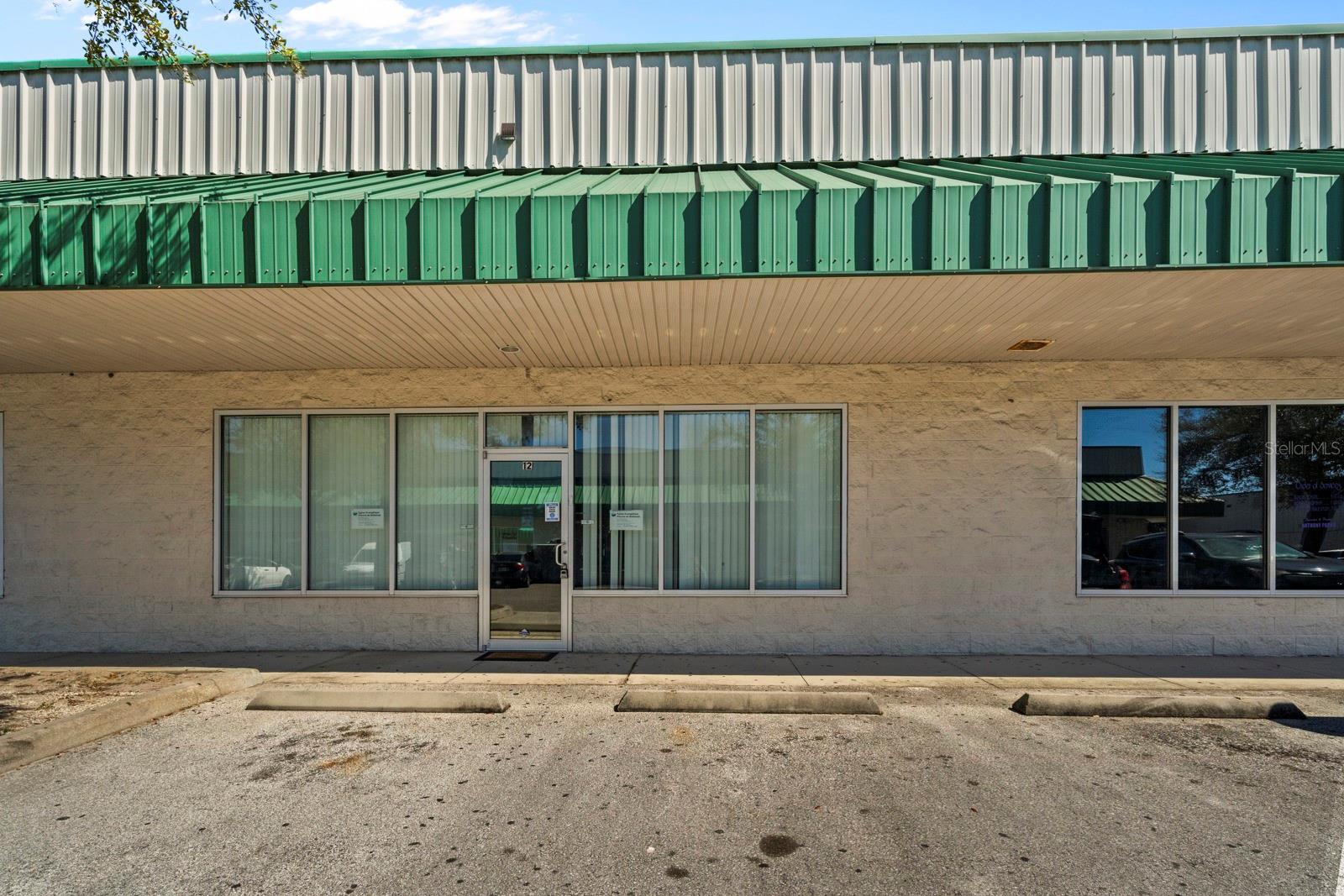 FEDERAL OPPORTUNITY ZONE — TWO ADJOINING UNITS, ONE PRICE. A rare chance to acquire two adjoining mixed-use commercial condos (±2,564 SF combined) sold together as one in one of Orlando's most actively developing corridors, with potential capital-gains advantages for qualifying Opportunity Zone investors (consult your tax advisor). Each ±1,282 SF unit features private offices, open work areas, and functional layouts suited for professional services, medical or wellness practices, boutique retail, or creative studios. Operate both as a single expanded headquarters, occupy one and lease the other for income, or hold both as rentals. SBA-eligible for owner-occupants — own your workspace for roughly what you pay in rent, with as little as 10% down. WHY THIS LOCATION, WHY NOW: The City of Orlando has officially targeted the West Colonial corridor for redevelopment, actively investing in planning and infrastructure to drive high-quality growth to this exact area. Orange County's new Innovation Center opens just minutes away on West Colonial Drive in early 2026, bringing entrepreneurs, funding, and business resources to your doorstep. UCF projects Orlando's 2026 employment growth at 1.3% — outpacing Florida's 0.8% and nearly triple the national average of 0.5%. Over the next decade, Orlando is forecast to be Florida's #1 job growth center, surpassing Miami, Tampa, and Jacksonville combined. Travel + Leisure Co. and Novartis have already committed billions to the region, and Orlando's industrial/flex vacancy dropped to 7.2% in Q4 — its lowest since early 2024. THE PROPERTY: Built 2006, block construction, central A/C, professionally managed complex with ample parking and immediate access to John Young Pkwy, SR-408, West Colonial Dr (SR-50), and I-4 — minutes to Downtown Orlando. PACKAGE OPPORTUNITY: Combine with adjoining Unit 13 (listed separately, MLS S5146021) to control ±3,846 SF in one complex. Two units. One price. One powerful move. Own your space. Own your future. Own Orlando.