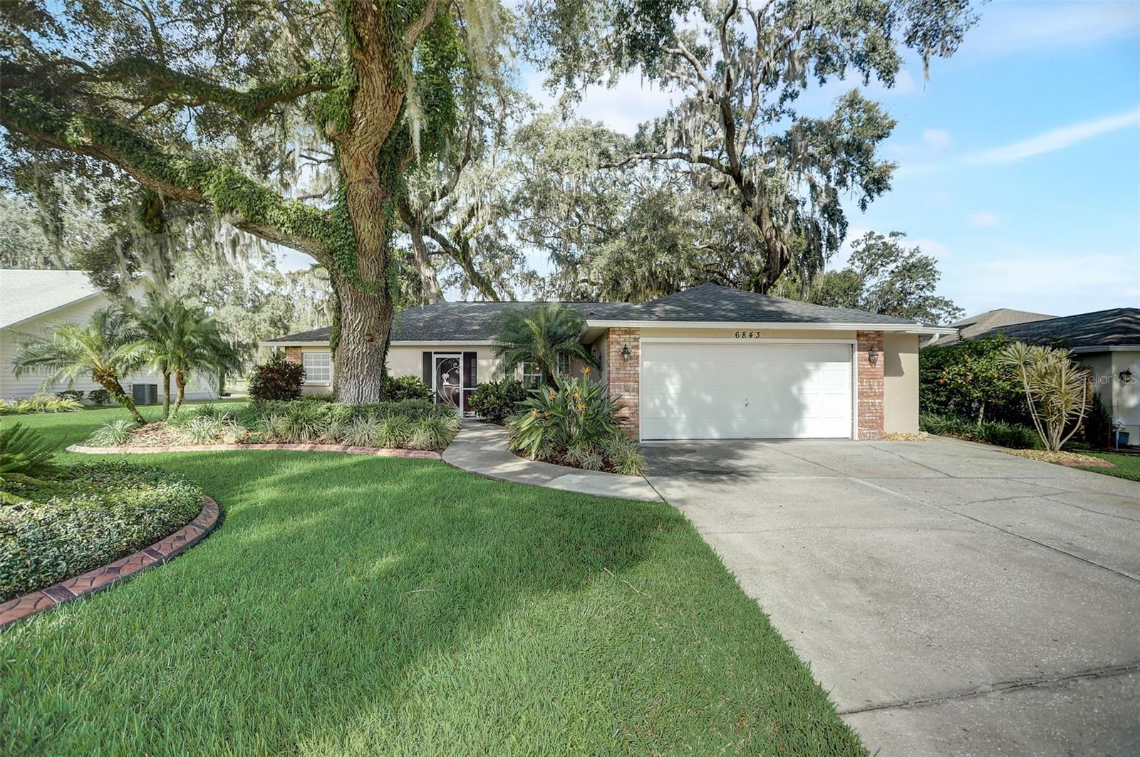 Welcome to the epitome of luxurious living in the prestigious Silver Oaks community! This meticulously maintained gem offers an unparalleled combination of elegance, convenience, and natural beauty.

Nestled on a sprawling yard that gracefully merges with the lush green fairways of the adjacent golf course, this home is a true haven for golf enthusiasts and nature lovers alike. Silver Oaks, an established and picturesque community, sits just moments away, providing you with easy access to all the shops, restaurants, and entertainment you could ever desire.

Step inside this 1,528 sqft masterpiece, and you'll be greeted by an open concept layout that exudes sophistication. No detail has been overlooked, and no expense has been spared when it comes to the top-notch materials used in crafting this residence. High ceilings add an air of grandeur, infusing every room with an abundance of natural light.

But the true magic unfolds as you step onto the expansive screened lanai. This outdoor oasis is perfect for entertaining or simply unwinding in style. It boasts a fire pit, hot tub, grill, and a dining set with four chairs and a table – all included. Imagine evenings spent under the starlit sky, creating cherished memories in your very own private retreat.

This isn't just a house; it's a lifestyle upgrade. Your opportunity to own a piece of Silver Oaks luxury has arrived. Don't miss out on the chance to make this impeccable property yours today!