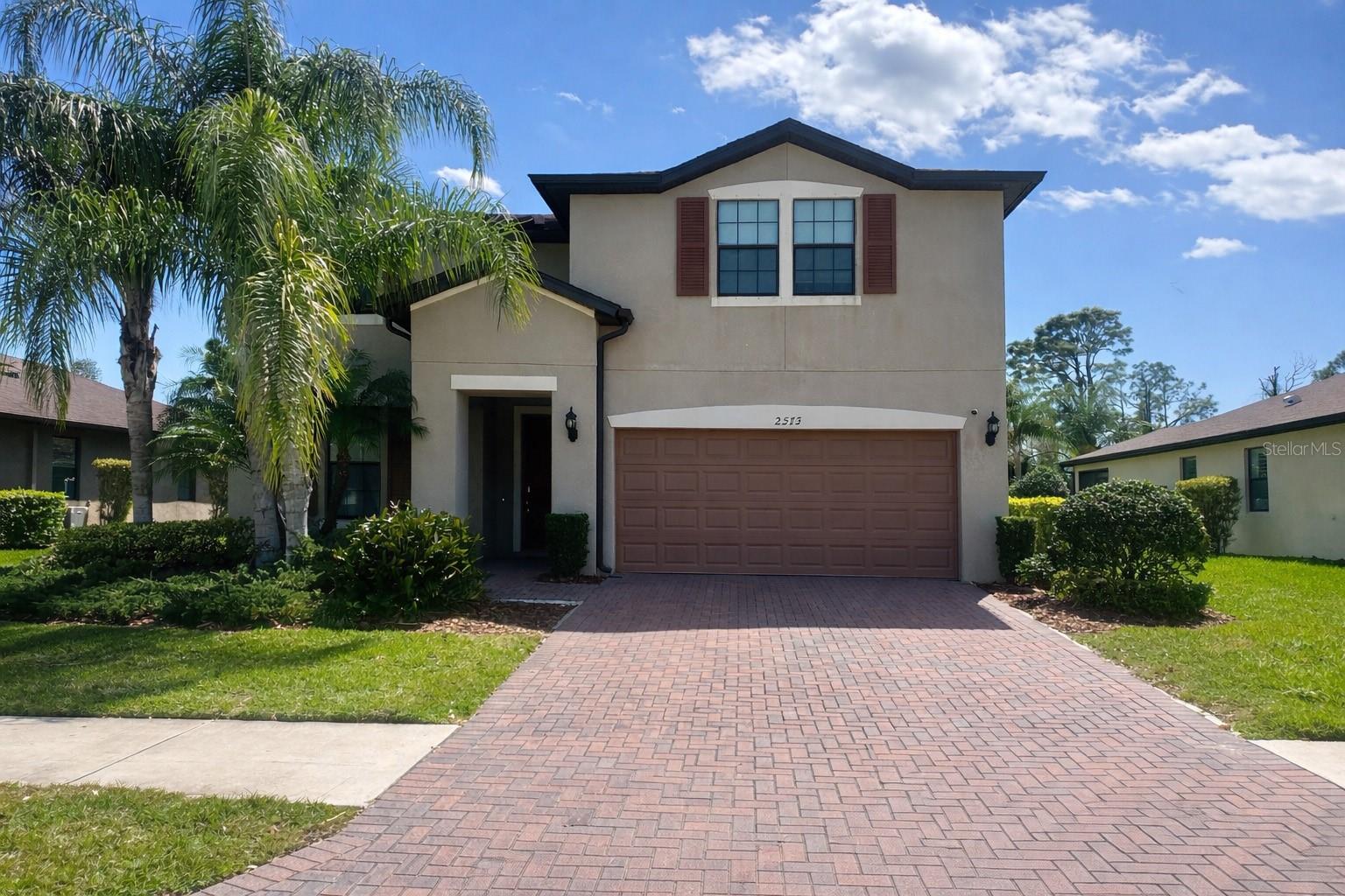 Short sale- an incredible opportunity to own a newer pool home at an exceptional value. One or more of the photos have been virtually staged. Welcome to this stunning 2018-built home located in the sought-after Cedar Grove community, offering 4 bedrooms, 2.5 bathrooms, and 2,856 heated square feet of beautifully designed living space. From the moment you enter, you'll be impressed by the bright, open-concept layout, enhanced by neutral tile flooring, abundant natural light, and modern finishes throughout. The spacious living area seamlessly connects to the dining space and gourmet kitchen, creating the perfect setting for both everyday living and entertaining. The kitchen is a true centerpiece, featuring granite countertops, stainless steel appliances, rich cabinetry, and a large island with bar seating - ideal for gatherings and casual dining. The desirable split-bedroom floor plan offers a private primary suite on the main level, complete with a spacious en-suite bath featuring dual vanities, a walk-in shower, and a generous walk-in closet. Also on the first floor are the ample-sized formal dining room, guest bathroom, and indoor laundry room. Upstairs, your flex space can be the perfect game room or whatever fits your needs. Additional upstairs bedrooms provide flexibility for family, guests, or a home office. Your second full bathroom is also conveniently located upstairs. Step outside to your own private Florida oasis - an expansive screened lanai with pool and spa, surrounded by lush landscaping and a fully fenced yard for added privacy. Whether you're hosting guests or enjoying a quiet evening, this outdoor space delivers the ultimate Florida lifestyle. Additional highlights include a paver driveway, a two-car garage, and well-maintained curb appeal. Ideally located, just minutes from shopping, dining, and entertainment, this home offers both convenience and comfort. Look no further!