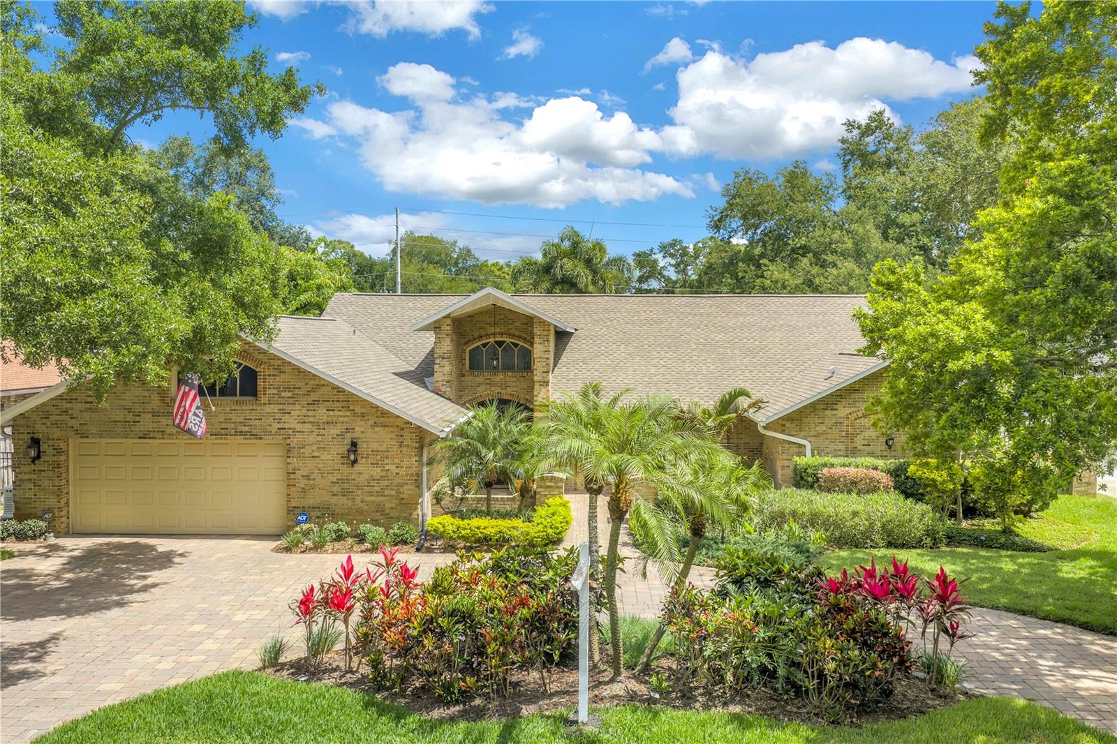 "Luxury Private Oasis"
Welcome to one of Windtree Oaks' most impressive offerings - a meticulously updated
executive residence where luxury, quality, and peace of mind come together. This
exceptional home offers the rare opportunity to enjoy a truly turnkey lifestyle and peace
of mind with thoughtful improvements and modern upgrades. Close to shopping,
restaurants, great schools and Walsingham Park and the Pinellas trail. 
NO FLOOD ZONE! This home has it all.
Inside, you'll find a spacious and thoughtfully updated floor plan with elegant living
spaces enhanced by cathedral ceilings and plenty of natural light. Separate living room
and family room with wood-burning fireplace. The heart of the home is the beautifully
remodeled kitchen, showcasing elegant quartz countertops, designer tile backsplash,
top-of-the line Samsung appliances including an induction cooktop with convection
oven, full-sized Bespoke refrigerator and abundant storage and space for gathering and
entertaining. Custom Closets by Design systems enhance the primary suite and
secondary bedrooms, while remodeled bathrooms provide a spa-like experience. The
spacious Primary Bedroom offers a spa-like ensuite with double vanity, freestanding
soaking tub, spacious shower and heated towel rack. This home boasts an extra space
off the Primary Bedroom that could be used as an office, a gym, a nursery or craft
space.

Recent major improvements include complete HVAC and ductwork replacement, air
purification system including Remi halo and UV light, Rinnai tankless propane water
heater, upgraded electrical panel and wiring, whole house Generac generator, high-
impact Renewal by Andersen windows and doors, and extensive professional
landscaping.
The backyard is a luxurious private oasis featuring a fully rebuilt pool with sun shelf and
large spa with new salt chlorination system and propane heater, new cool touch
decking, and lush mature landscaping. Whether hosting guests or enjoying a quiet
evening at home, this outdoor retreat is designed for year-round enjoyment.

Located in the highly desirable Windtree Oaks community, this extraordinary residence
combines timeless elegance with modern systems and upgrades rarely found in today's
market. Every major improvement has been completed, allowing the next owner to
simply move in and enjoy. This is more than a home—it's a lifestyle investment in one of
Seminole's most sought-after neighborhoods.