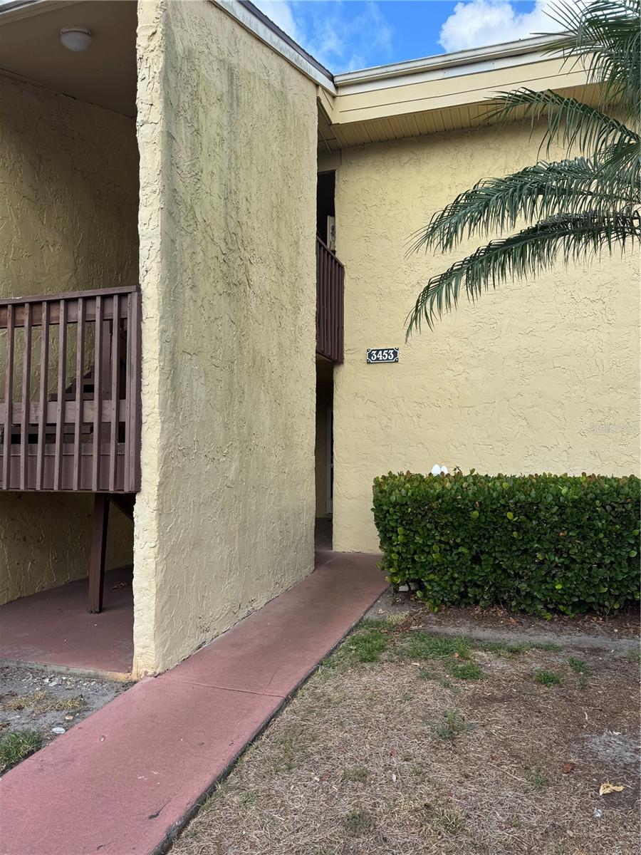 Perfect condo for full-time living, seasonal getaways, or an investment opportunity at an affordable price! This charming 1-bedroom, 1-bathroom has Soft carpet flooring throughout the living/dinning area and bedroom, with tile in the entryway, kitchen, and bathroom. The kitchen offers ample storage, granite countertops and stainless appliances. This unit has a quiet balcony view,  perfect for entertaining guests. This home owner has added 4 CEILING FANS, NEW CLOSET SYSTEM, NEW A/C 2025, and a NEW MOTORIZED TERRACE SCREEN. The community has a heated pool, BBQ area and a fenced around dog run. The monthly fee includes: water, sewer, trash collection, building insurance and exterior maintenance including the roof and grounds.Conveniently located near excellent shops and restaurants, this condo is just 3 miles from Crescent Beach and only 4 miles from Siesta Key Public Beach. Sarasota downtown, The Ringling Museum, Selby Gardens, St. Armands Circle, Island Park, Marina Jack's Harbor,.... are only a short drive away.