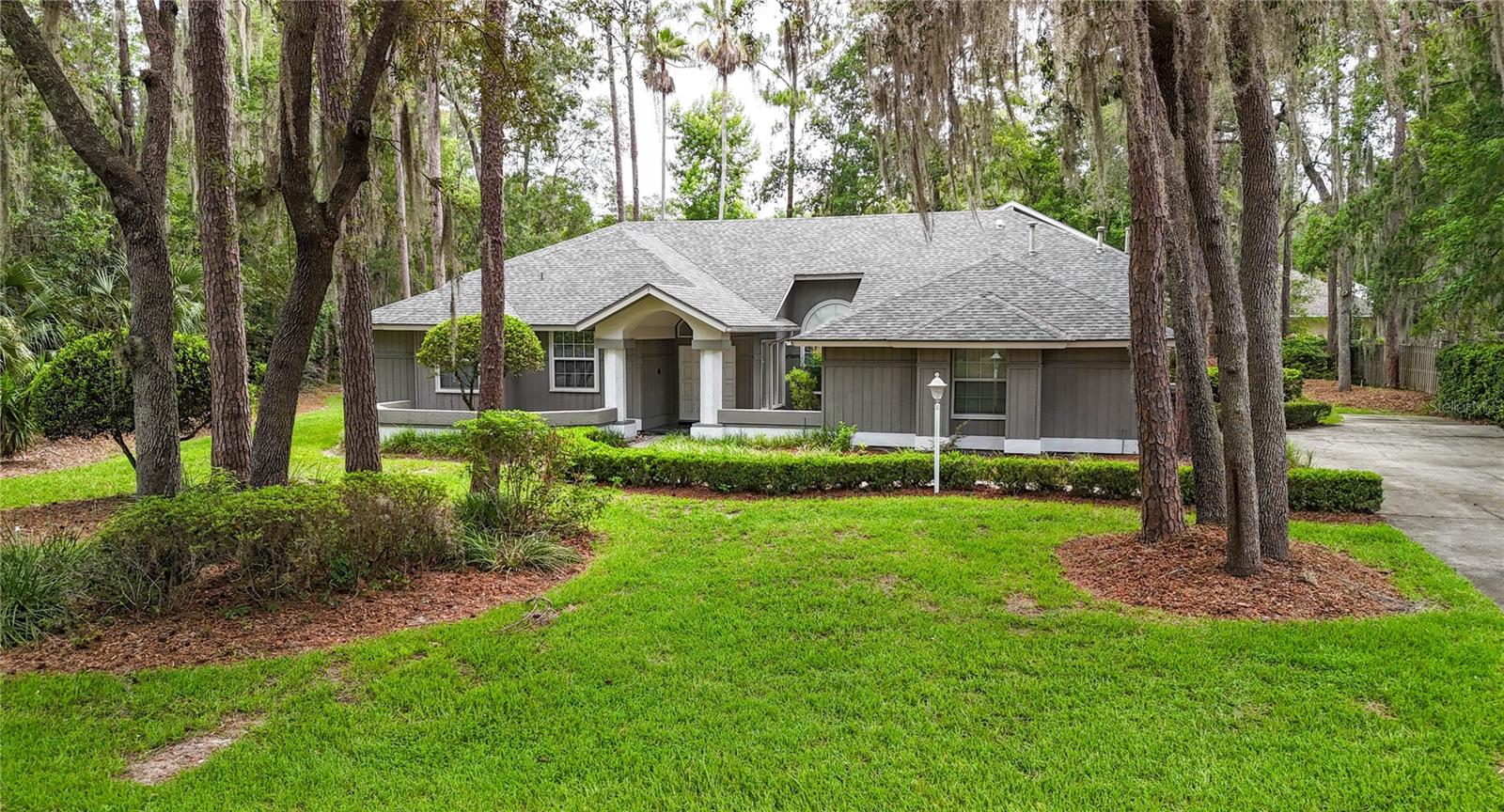 Discover your spacious retreat comfortably situated in the desirable Huntington neighborhood.  Explore this 6 bedroom, 3.5 bath pool-home, elegantly designed in a 3-way split floor plan which ensures function and privacy!  Over 4,300 sq. ft. of living space on more than half an acre provides ideal space for various simultaneous uses;  Featuring high ceilings, abundant natural light, and clever views of the screened pool area, enjoy the generous primary suite complete with luxurious en-suite bath with double vanities, walk-in shower, jetted tub, and walk-in closet; a private office, formal living and dining rooms huge bonus room, a large family room with fireplace, a modern kitchen with island bar, breakfast nook, and modern appliances.  An upstairs bonus room offers space for a gym, theater, second office, or playroom. Additional highlights include an indoor laundry room, two-car garage, spacious guest bedrooms, and ample storage.

Step outside to your private backyard oasis with a screened-in porch with pool and spa, perfect for relaxing and entertaining. Recent updates include new roof appliances and re-surfaced pool.

Conveniently located near top-rated schools, shopping, dining, Santa Fe College, UF, Shands and VA, this home is ready for you to enjoy Florida living at its best!