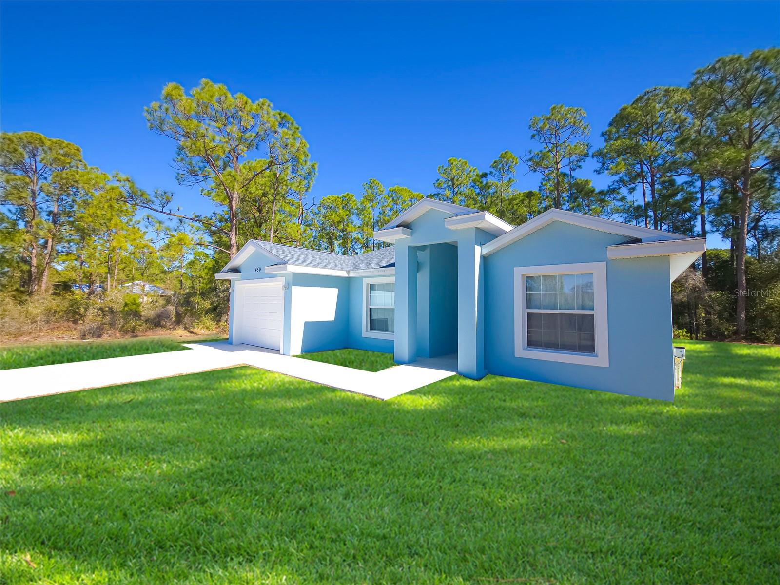 Charming 3-Bedroom, 2-Bath New Construction Home, located in the beautiful community of Placid Lakes.  Welcome to this stunning newly built home, perfectly blending modern design with everyday comfort. From the moment you arrive, you’ll be greeted by a fresh light-blue exterior and a spacious driveway leading to your attached garage.  Step inside to discover an inviting open layout filled with natural light. The home features luxury vinyl plank flooring throughout the living spaces, sleek ceiling fans throughout the home, also including central air and heat. A freshly modern home ready for your personal touch.  The kitchen is a chef’s delight, showcasing stainless steel appliances, granite countertops, and shaker cabinets that provide both style and ample storage. The bathrooms continue the elegant theme with granite vanities, modern fixtures, and floor-to-ceiling marble-style tile in the showers for a spa-like feel.  With three generously sized bedrooms and two full baths, this home offers plenty of room for family and guests. The master suite includes a private en-suite bath, spacious walk-in closet, while the two additional bedrooms share a beautifully appointed bathroom.  Nestled on a quiet 1/4 acre lot surrounded by trees, with canal on the rear, this property offers a serene and safe atmosphere while still being conveniently located near by Lakes, churches, schools, shopping centers, dining, major roadways and world class fishing. Features You’ll Love:3 spacious bedrooms, 2 full bathrooms, Open-concept layout with modern finishes, Stainless steel appliances & granite counters, Stylish bathrooms with marble-style tile, Attached garage & large driveway, Freshly built, move-in ready. Don’t miss the opportunity to make this beautiful new home yours!