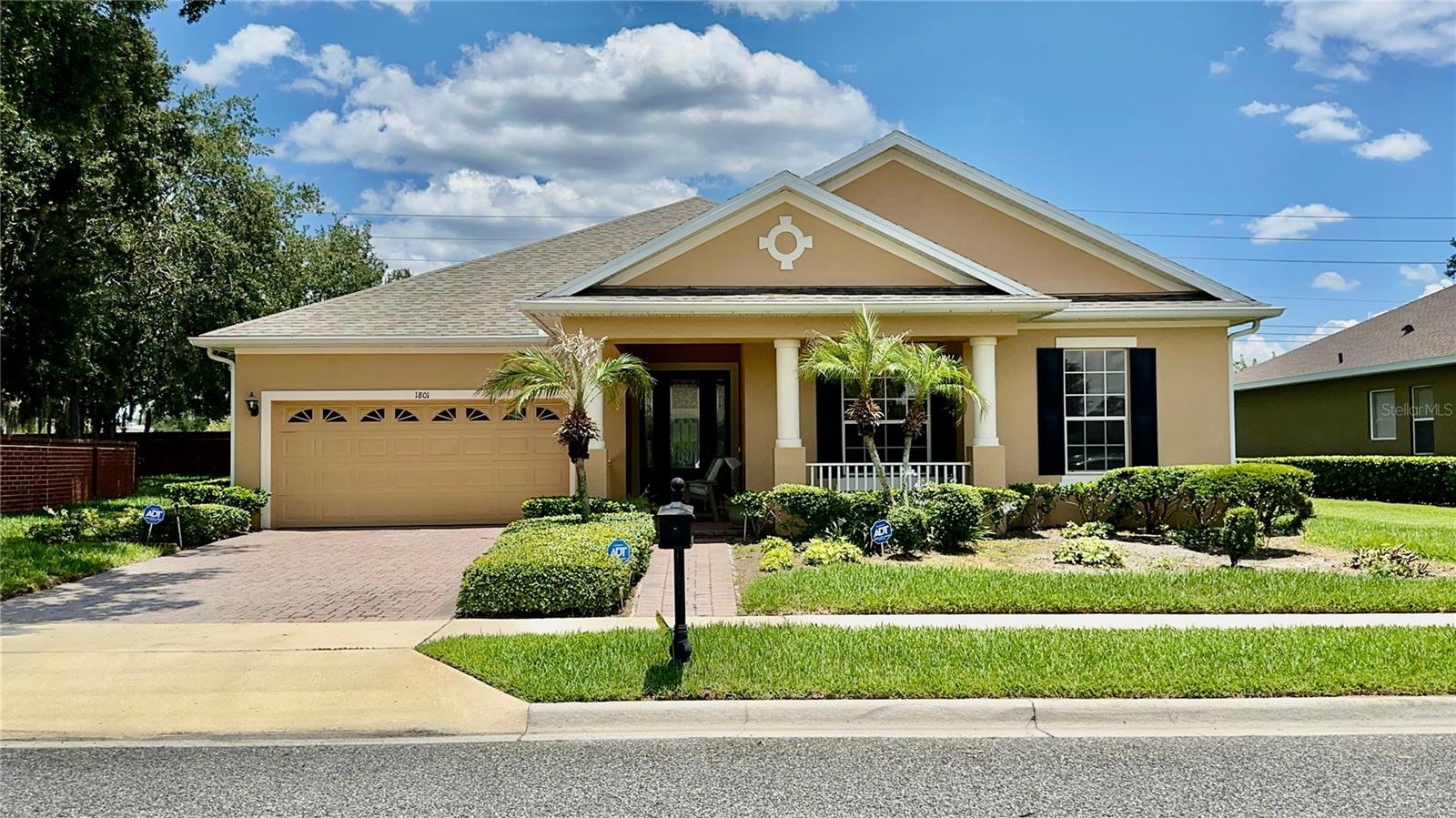 Callaway Model built by Taylor Morrison Home: Welcome home to this beautifully maintained residence offering exceptional curb appeal and timeless Florida charm. From the moment you arrive, you'll appreciate the attractive paver driveway, manicured landscaping, lush lawn, and welcoming covered front porch accented by elegant columns and mature palm trees.
The home's inviting exterior showcases a desirable split bedroom style appearance, a spacious two car garage, and a thoughtfully landscaped front yard that creates a warm first impression. Situated in a well kept community, this property offers the perfect blend of comfort, style, and functionality.
Whether you're enjoying your morning coffee on the front porch or welcoming guests into this charming home, you'll appreciate the pride of ownership evident throughout. Conveniently located near shopping, dining, entertainment, major roadways, and all that Winter Garden has to offer.
Don't miss this opportunity to own a move-in-ready home in one of Central Florida's most sought-after areas! Roof was replaced in March 2026, AC 2018, Water Heater is newer.