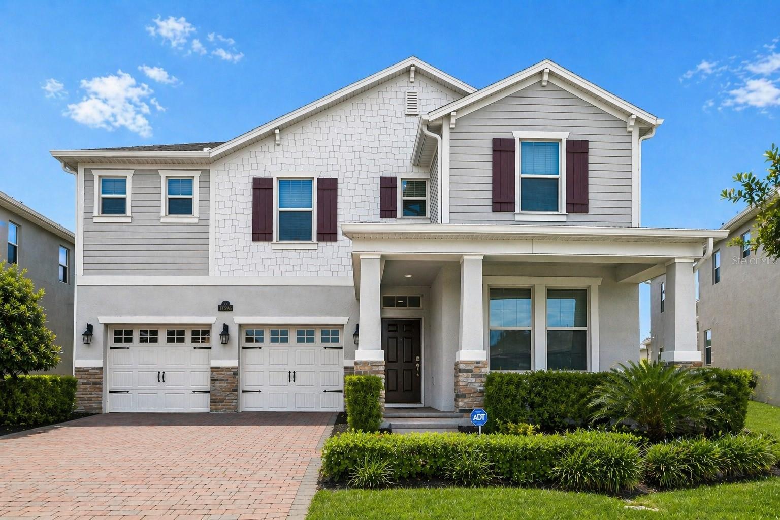 Virtually Staged. One or more photo(s) has been virtually staged. Experience refined Florida living in this exceptional 2023-built lakefront home in the highly sought-after Waterleigh community of Winter Garden. Set on a premium lot with serene natural lake views, this residence offers a perfect blend of modern design, smart technology, and everyday convenience. The bright, open-concept layout is filled with natural light and seamlessly connects the living, dining, and kitchen areas—ideal for both daily living and entertaining, all enhanced by tranquil water views. The gourmet kitchen features sleek countertops, ample cabinetry, and a large island designed for gathering. Upstairs, upgraded hardwood flooring throughout adds elegance and durability. The spacious primary suite offers a spa-inspired bath and walk-in closet, while additional bedrooms provide flexibility for family, guests, or a home office. Enjoy breathtaking lake views and Florida sunsets from your private outdoor space. A smart home system with integrated security enhances comfort and peace of mind. Prime location: Resort-style community amenities, top-rated schools within the neighborhood, Publix nearby, ~17 minutes to Disney, and easy access to highways, dining, shopping center.