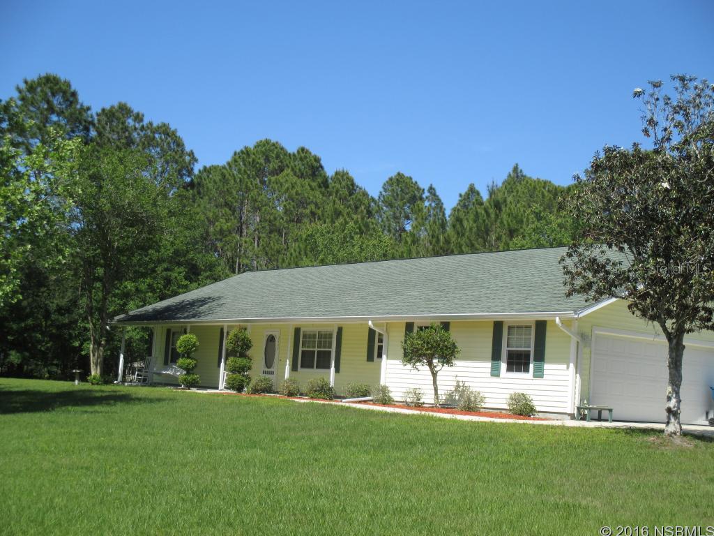 THIS IS A 2.5 ACRE PIECE OF HEAVEN! HOME HAS A LIVING ROOM, 2 DINING ROOMS (ONE HAS A CLOSET AND COULD BE ANOTHER BEDROOM,OFFICE), FAMILY ROOM AND HUGE PORCH AND SCREENED IN GROUND POOL. THE GARAGE CONVERTED INTO A COMPLETE MOTHER IN LAW UNIT WITH A FULL KITCHEN, FULL BATH AND SEPARATE BEDROOM AND LIVING  ROOM. NEWER ROOF AND SEPTIC AND 2 LARGE STORAGE SHEDS AND A CHICKEN COOP! CLOSE TO PAVILION SHOPPING AND A QUICK TRIP TO 95 AND ISB. PROPERTY SIDES AND REAR ARE FENCED. JUST THE HOME YOU NEED FOR THE EXTENDED FAMILY!