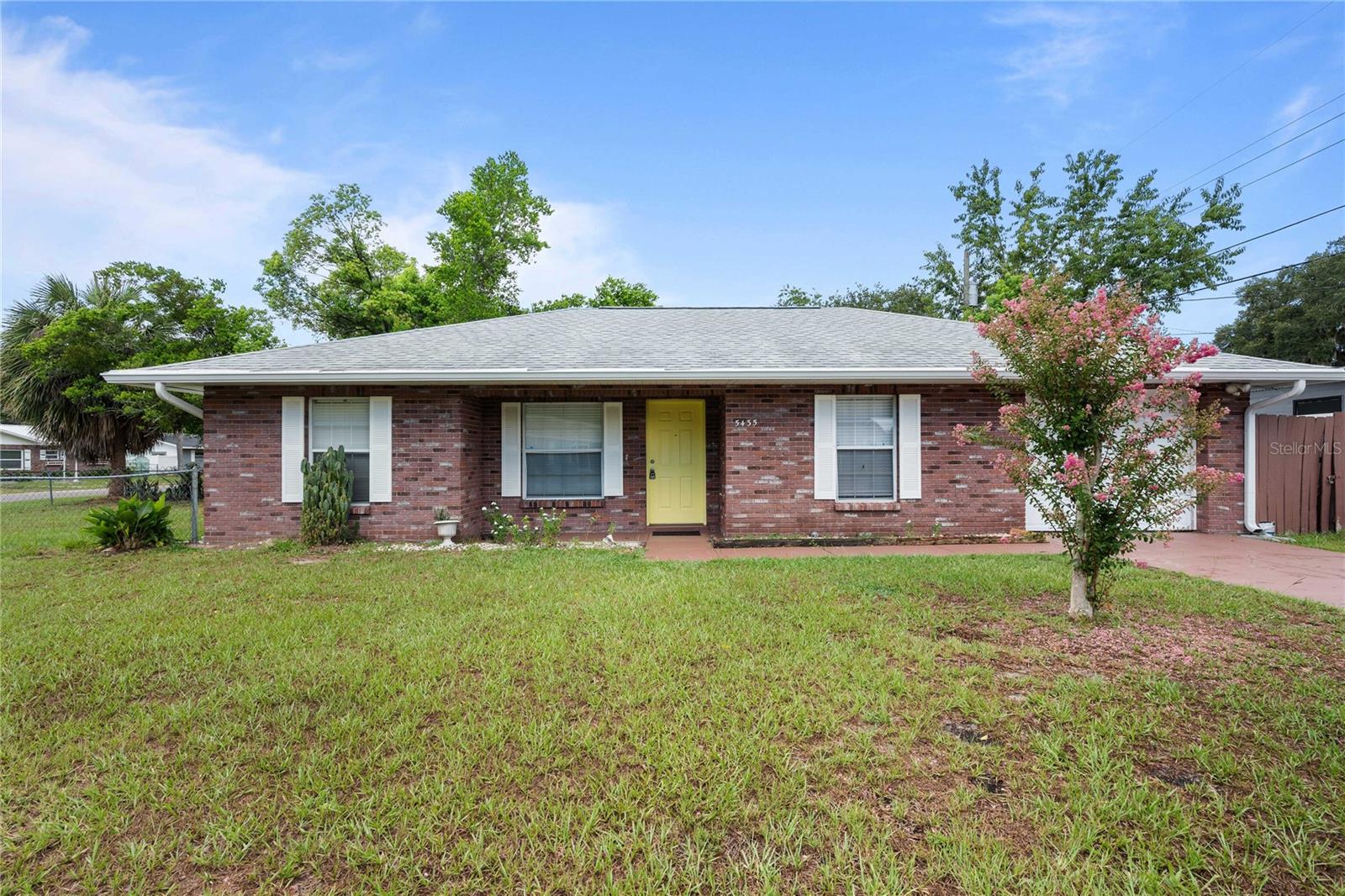 Charming 3-Bedroom Home on a Prime Corner Lot in Zephyrhills! Welcome to 5435 Tangerine Dr, a beautifully maintained 3-bedroom, 2-bathroom home that combines comfort and style in one inviting package. Freshly painted throughout, this home features newly remodeled bathrooms that add a modern touch to everyday living. Enjoy the convenience of a one-car garage and a washer/dryer hookup for easy laundry days. The fenced back and side yard provide plenty of room for outdoor activities. Situated on a desirable corner lot, this home offers added space and curb appeal. Perfect for anyone seeking a move-in ready home in a friendly neighborhood. Don’t miss the opportunity to make this charming Zephyrhills residence your own!