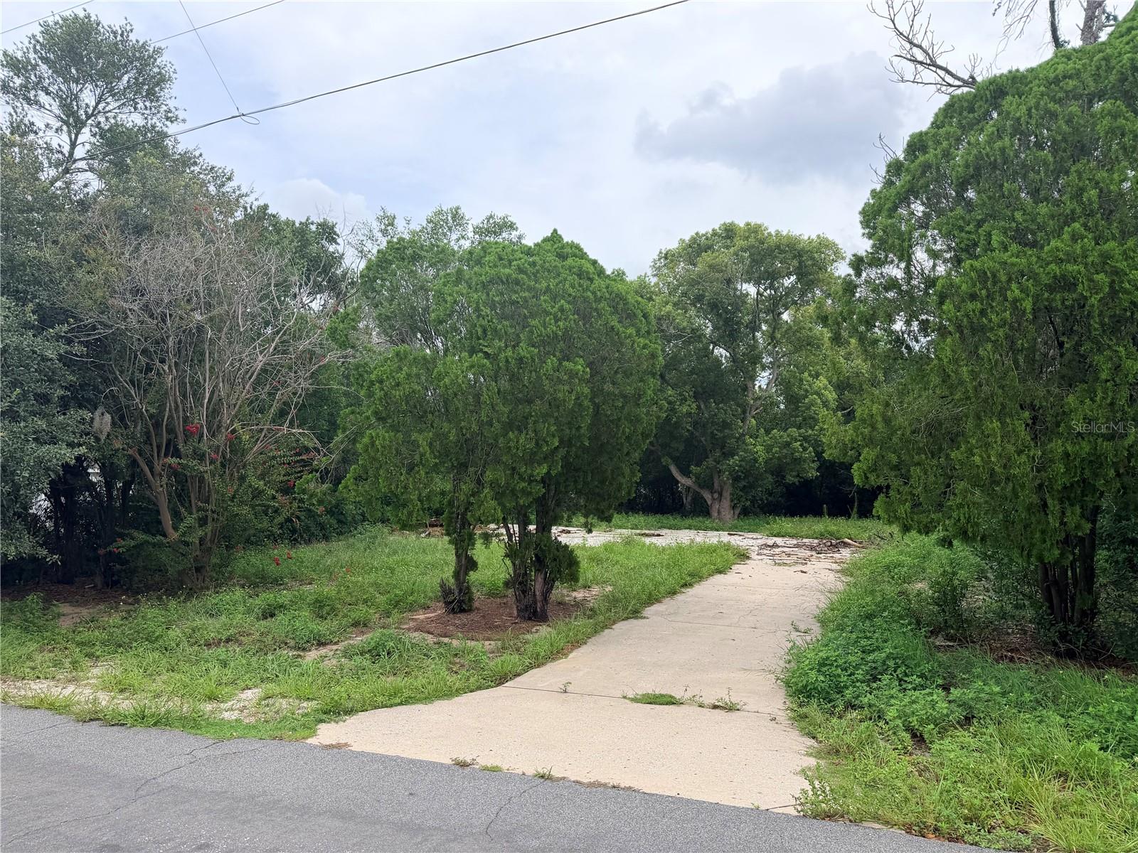 Impact Fees are already Paid!! Build your Dream Home on this Beautiful lot nestled in a desirable location of Spring Hill. This property offers a tranquil ambiance and convenient access to various amenities. Outdoor enthusiasts will be delighted in the proximity to Pine Island Beach, just a short distance away. Enjoy the sunshine, the sparkling waters, and the sandy shoreline. For even more adventure, the nearby Weeki Wachee River offers kayaking, paddleboarding, and boating opportunities. Convenience is at your fingertips with easy access to the 589 Expressway, allowing for a stress-free commute to Tampa and its vibrant metropolitan area. Whether you need to travel for work, explore the city's attractions, or catch a game or concert, the proximity to this major transportation route ensures a seamless journey. Discover the potential that awaits on this remarkable property. Don't miss out on the chance to call this slice of paradise your own. Schedule a visit today and start envisioning the endless possibilities for your future home!