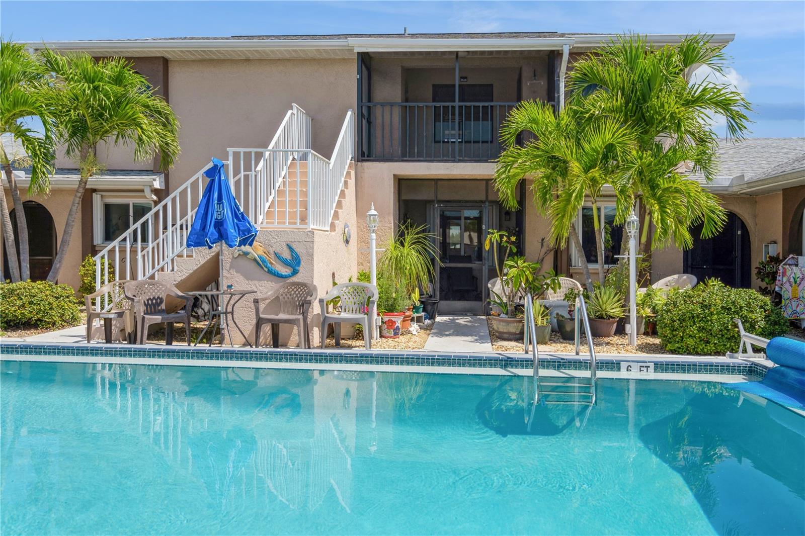 Welcome to your Little Slice of Paradise-Or your next Investment Opportunity. This adorable, open floor plan condo is waiting for you to make it home! This community has Never flooded, and With no damage from any of the last few hurricanes, and Too many updates to list, this is NOT one to miss. Centrally located with tons of shopping and restaurants nearby. Updates include-BRAND NEW HVAC (2023), Roof (2023), newer kitchen with quartz counters, soft close cabinets and drawers, and LVP flooring. The windows are all HURRICANE PROOF, new bathroom fans, lights, ceiling fans in bedrooms, and more. You will enjoy the in unit front load washer and dryer, and all the natural light this unit provides. Both bedrooms have custom shelving, and the second bedroom has cedar lined closets and shelving! All that's left to do is come relax by the heated pool, and soak in the sunshine in this delightful tight knit community. Let's get you in your new home so you can enjoy the good life.