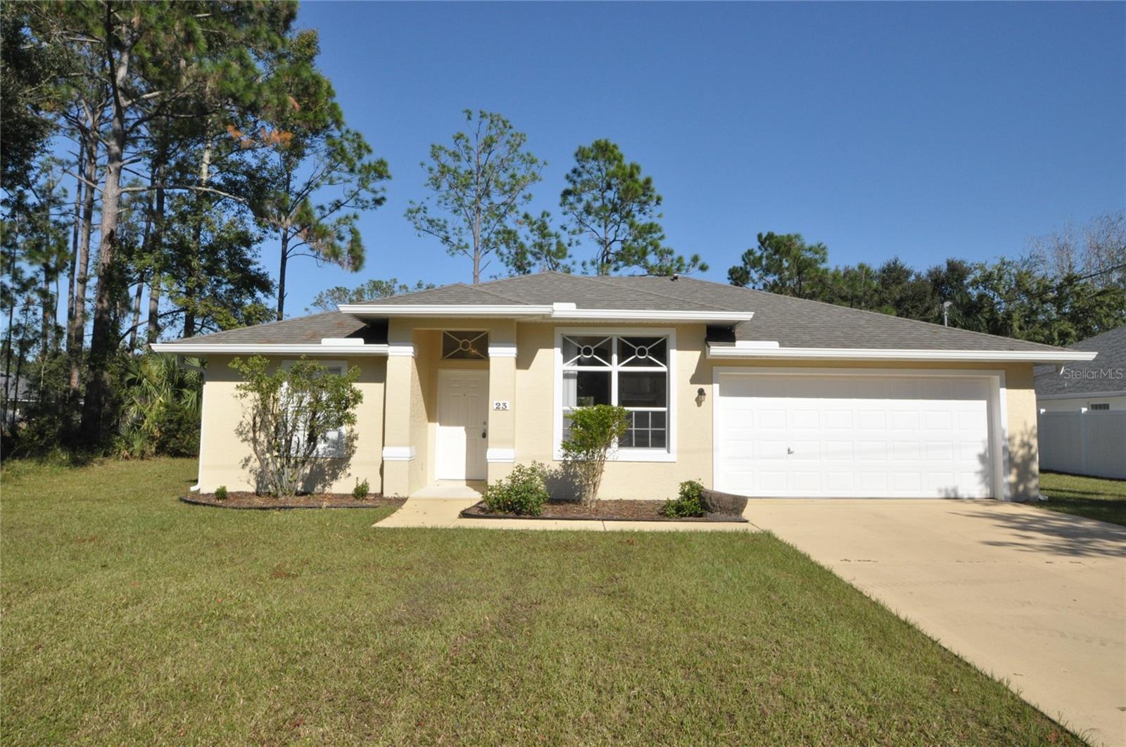 Indulge in the tranquility and comfort of this charming 3-bedroom, 2-bathroom haven nestled at 23 Primrose Ln, Palm Coast, FL. Offering a generous 1,205 square feet of thoughtfully designed living space, this delightful home is the perfect retreat for those seeking a harmonious blend of style and functionality. The open floor plan invites you to create memorable moments, whether entertaining guests or enjoying a peaceful evening with loved ones. Each bedroom provides a serene sanctuary, awash with natural light and ample space to encourage restful nights and rejuvenating mornings. The two full bathrooms ensure convenience and privacy, making everyday routines a breeze. Located in the heart of Palm Coast, this residence offers easy access to the area's best dining, shopping, and recreational activities, ensuring a vibrant lifestyle. Imagine leisurely strolls through nearby parks, or basking in the Florida sun on the stunning beaches just a short drive away. The inviting ambiance of this home is complemented by its pristine surroundings, making it a true gem for those desiring both comfort and adventure. Discover your ideal living experience at 23 Primrose Ln, where every day is a new opportunity to savor the joys of life in beautiful Palm Coast.