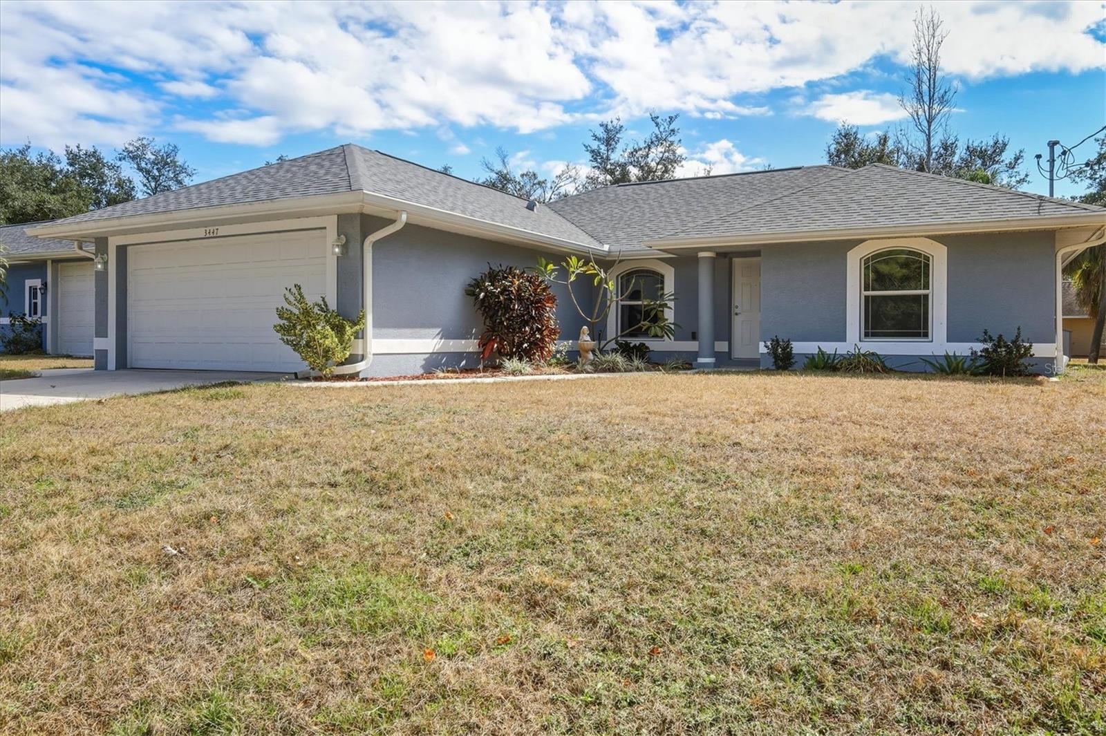 THIS PROPERTY QUALIFIES FOR A 1% LENDER INCENTIVE IF USING OUR PREFERRED LENDER! This inviting three-bedroom, two-bath home features a split floor plan with open living spaces, vaulted ceilings, and abundant natural light. The kitchen offers solid surface countertops, a breakfast bar overlooking the living area, black stainless appliances including a new range and micro-hood, a French-door refrigerator, and dish washer. The primary suite includes a walk-in closet and en suite bath with dual sinks and a walk-in shower, while the guest bath features a tub/shower combination. Recent upgrades include a roof just three years old, double-paned windows with hurricane shutters, rain gutters all around the home, fresh Interior & Exterior paint, a new water heater, water softener and purification system, and a NEW toilets, NEW carpet in living room & primary bedroom. Outdoors, enjoy mature landscaping, yard was resodded,  a relaxing patio, and a spacious backyard ready for future enhancements. Two-car garage, has secure hurricane door, and interior laundry. No HOA, no CDD, and not in a flood zone.
Located in the heart of North Port, this home is surrounded by natural beauty, outdoor recreation, and everyday conveniences. The city is known for its freshwater canals, scenic trails, and nearby preserves including Myakkahatchee Creek Environmental Park and Myakka State Forest. Residents enjoy access to Warm Mineral Springs, abundant parks and recreation facilities, cultural venues, and easy drives to Venice Beach, Manasota Key, and Casey Key. With shopping, dining, and major routes close by, North Port offers a perfect balance of relaxed Florida living and modern growth—ideal for full-time homeowners, seasonal residents, or investors. Don’t miss the opportunity to make this Florida retreat your own.