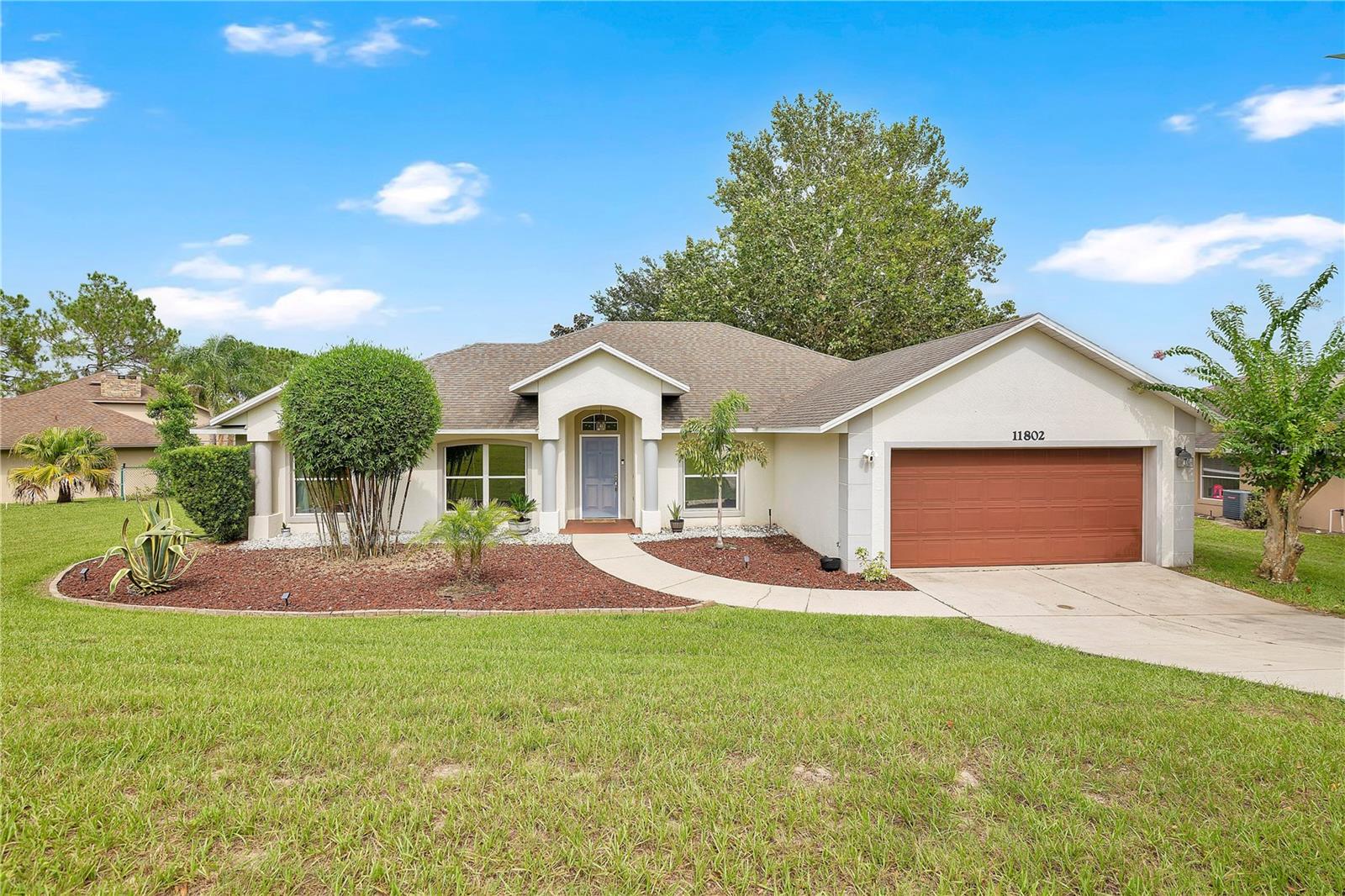 Escape the hustle and bustle of Clermont while still enjoying the convenience of being just minutes from shopping, dining, and everyday amenities. Nestled in a peaceful, more rural setting, this home offers the perfect balance of privacy and accessibility.
Residents enjoy exclusive access to a private boat dock on the Clermont Chain of Lakes, making it easy to spend your days boating, fishing, or simply enjoying Florida’s beautiful waterways. The HOA also includes RV and boat storage, a rare and valuable feature for outdoor enthusiasts.
Inside, the home is currently carpeted, but hardwood-look tile flooring is already underneath the carpet, offering buyers an exciting opportunity to reveal a durable and timeless flooring option.

Whether you’re looking for a quiet place to call home or a community that embraces the Florida lifestyle, this property offers exceptional value with unique amenities that are difficult to find.