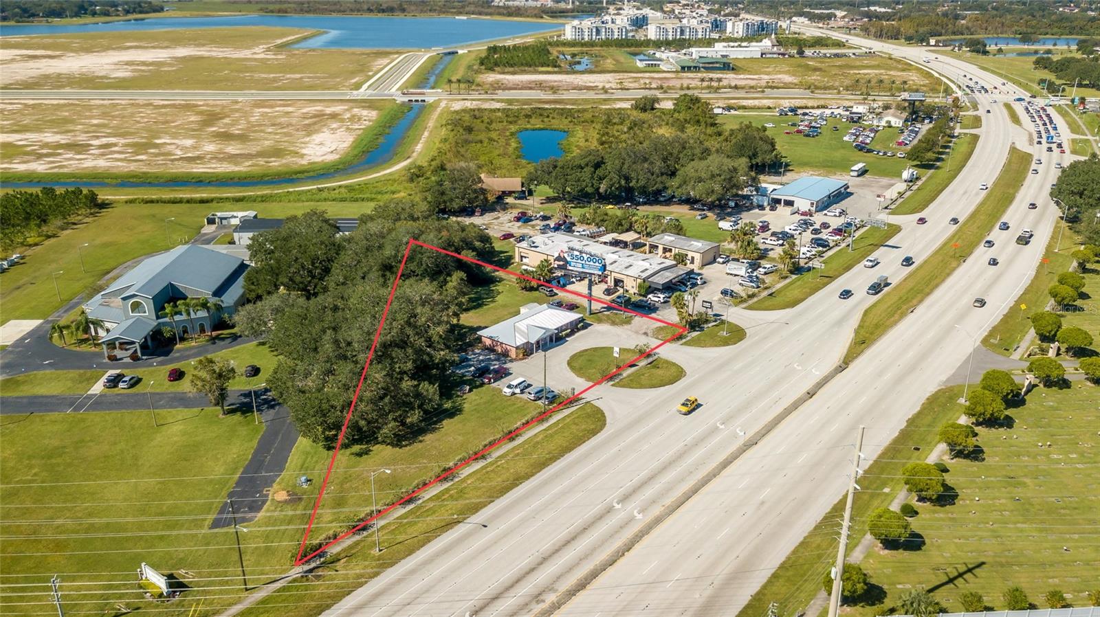 Frontage commercial property with exceptional exposure, ideally positioned along US-192 just outside the entrance to NeoCity and directly across from Osceola Heritage Park, a 210-acre entertainment and sports complex undergoing significant redevelopment. Surrounded by ongoing growth and sitting on over an acre, this site offers strong long-term value for redevelopment or owner-user opportunities.  

Osceola Heritage Park is currently the focus of a major transformation planned through 2025 and beyond.  A proposed $1 billion plus mixed-use sports and entertainment district, envisions a hotel, additional soccer fields, medical campus, commercial space, residential units, parking structures, and entertainment venues. Construction could begin as early as late 2025, positioning the area as a future national and international destination for sports, tourism, and community events.

Property Highlights:

• 1,980 SF Office Building
• 120 days to occupancy
• Prime frontage on US-192 with easy access to Florida’s Turnpike
• Located in a rapidly developing corridor with significant public and private investment

With major redevelopment underway across the street and continuous momentum in the surrounding market, this property offers exceptional visibility, steady income, and strong future potential.