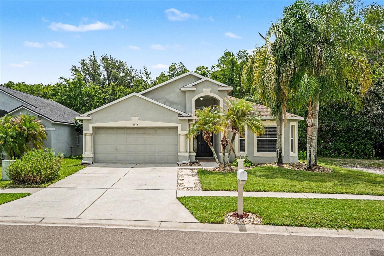 Welcome to this beautifully maintained pool home in the highly sought-after Wrencrest community of Meadow Pointe! This 4-bedroom, 3-bathroom home offers 1,850 square feet of comfortable living space designed for both relaxation and entertainment. The spacious kitchen includes granite countertops, stainless steel appliances, a dual-basin sink, ample cabinet storage, and a convenient eat-in dining area. The private primary suite is tucked away at the rear of the home and features peaceful backyard views, direct access to the lanai, and an en-suite bathroom. Enjoy added privacy with no rear or right-side neighbors. The covered lanai provides a shaded retreat for outdoor seating, while sliding glass doors open directly to your private screened pool area, creating the perfect space for entertaining or unwinding at the end of the day. Residents of Meadow Pointe enjoy access to outstanding community amenities, including a fitness center, community pool, pickleball courts, basketball courts, tennis courts, a splash pad, playgrounds, and more. These amenities are included through the CDD assessment, and there are no separate HOA fees. Conveniently located near shopping, dining, and major roadways, this home is also zoned for highly rated schools, making it an excellent choice for families seeking both comfort and convenience.