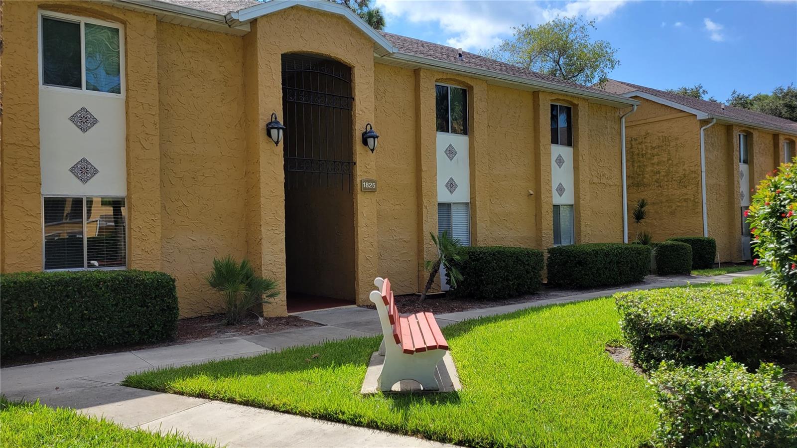 BACK ON THE MARKET-Annual unfurnished but could be furnished if needed. Spacious ground floor 2/2 with open floor plan and relaxing golf course view. This well located oasis is peaceful, with lush tropical landscaping and good amenities but you'll be close to shopping, dining, the library, museums, theater, downtown Sarasota and close to either Siesta Key Beach or Lido Beach. When you come home, you can workout in the fitness center, play billiards, take a dip in the pool and relax. The kitchen is galley style with an open window to the dining area and has loads of solid wooden cabinetry for storage. The dining area is open to the living room for great family time and ease of entertaining. The master suite is large with abundant closet space and en suite bathroom with walk in shower. Both bedrooms have ceiling fans. There is a washer and dryer in the unit. Double French doors lead from the living room to the patio over looking Palm Lakes golf course. This condo could be rented for 6 + months. There is assigned parking for one car and visitor parking. Call today!