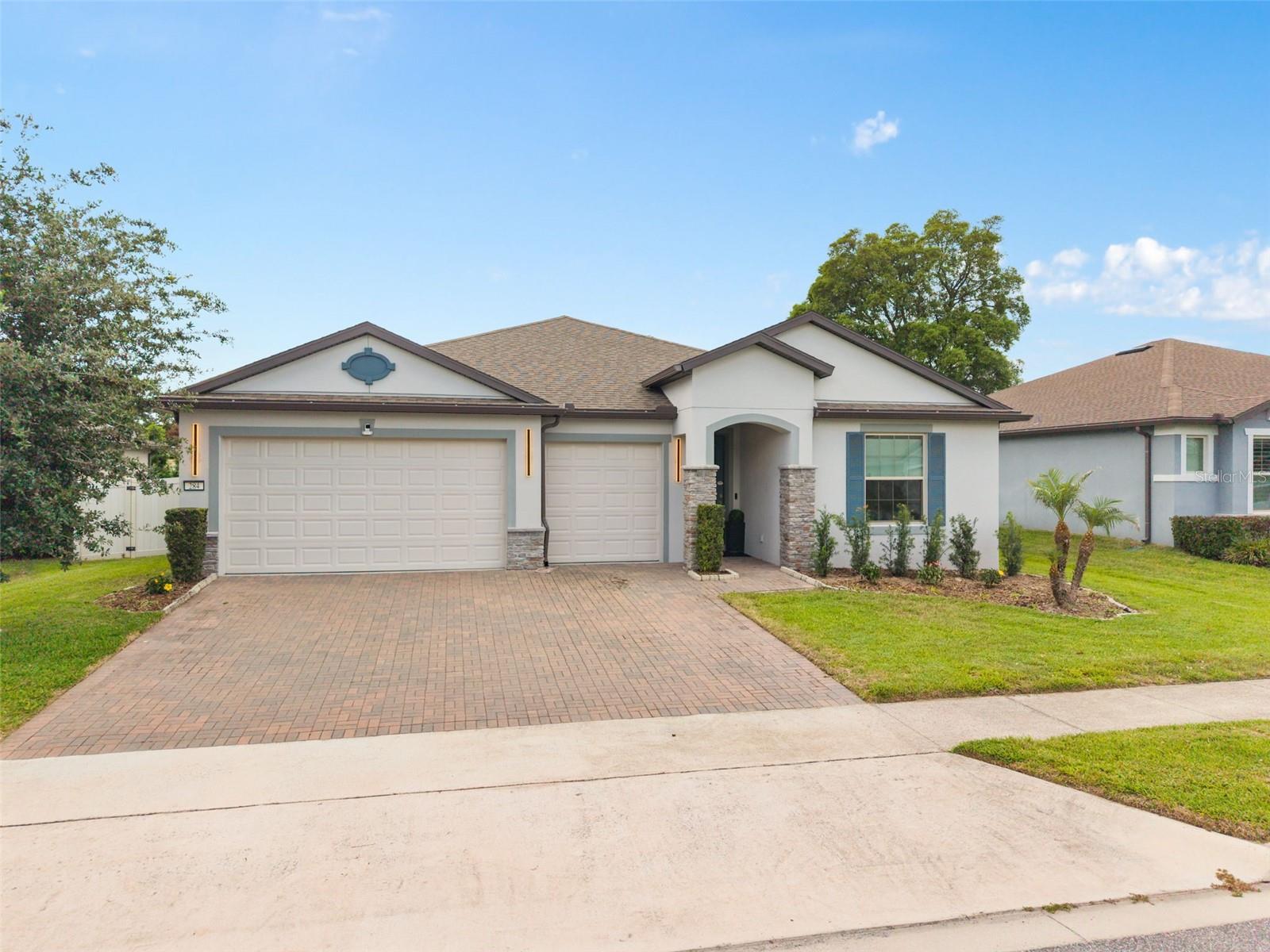 NEW PRICE—NOW OFFERED AT $759,900. Discover refined single-story living in The Retreat at Lake Brantley, an intimate gated community offering private access to Lake Brantley through the community boat ramp.
Built in 2021, this nearly new Dockside residence offers 4 bedrooms, 3 full bathrooms, approximately 2,692 square feet of heated living space, 3,759 total square feet, and an attached 3-car garage. An upgraded designer front door creates an impressive arrival, while the open-concept interior is enhanced by oversized tile flooring and thoughtfully selected finishes throughout the main living areas.
At the center of the home, the spacious gourmet kitchen is designed for everyday living and entertaining. Features include granite countertops, custom cabinetry, premium stainless steel appliances, generous storage, and an oversized island with ample seating and workspace. The kitchen opens seamlessly to the expansive great room, creating a comfortable and inviting gathering space.
Large pocket sliding glass doors extend the living area outdoors and provide abundant natural light, offering an effortless connection to the covered lanai and outdoor entertaining space.
The private owner’s suite provides a peaceful retreat with a custom walk-in closet and spa-inspired bathroom featuring dual vanities, an oversized walk-in shower, and full-height designer tile. Three additional bedrooms offer flexibility for guests, a home office, hobbies, or multigenerational living. One secondary bedroom includes its own private en-suite bathroom.
Additional features include modern smart-home technology, upgraded lighting and fixtures, a water treatment system, extensive storage, and a spacious 3-car garage.
Enjoy a gated Longwood address with access to the Lake Brantley lifestyle while remaining convenient to shopping, dining, major roadways, and Seminole County destinations.
Nearly new construction, single-level living, elevated finishes, a 3-car garage, and private community lake access come together in one exceptional property. Schedule your private showing of 284 Island Sound Court today.
