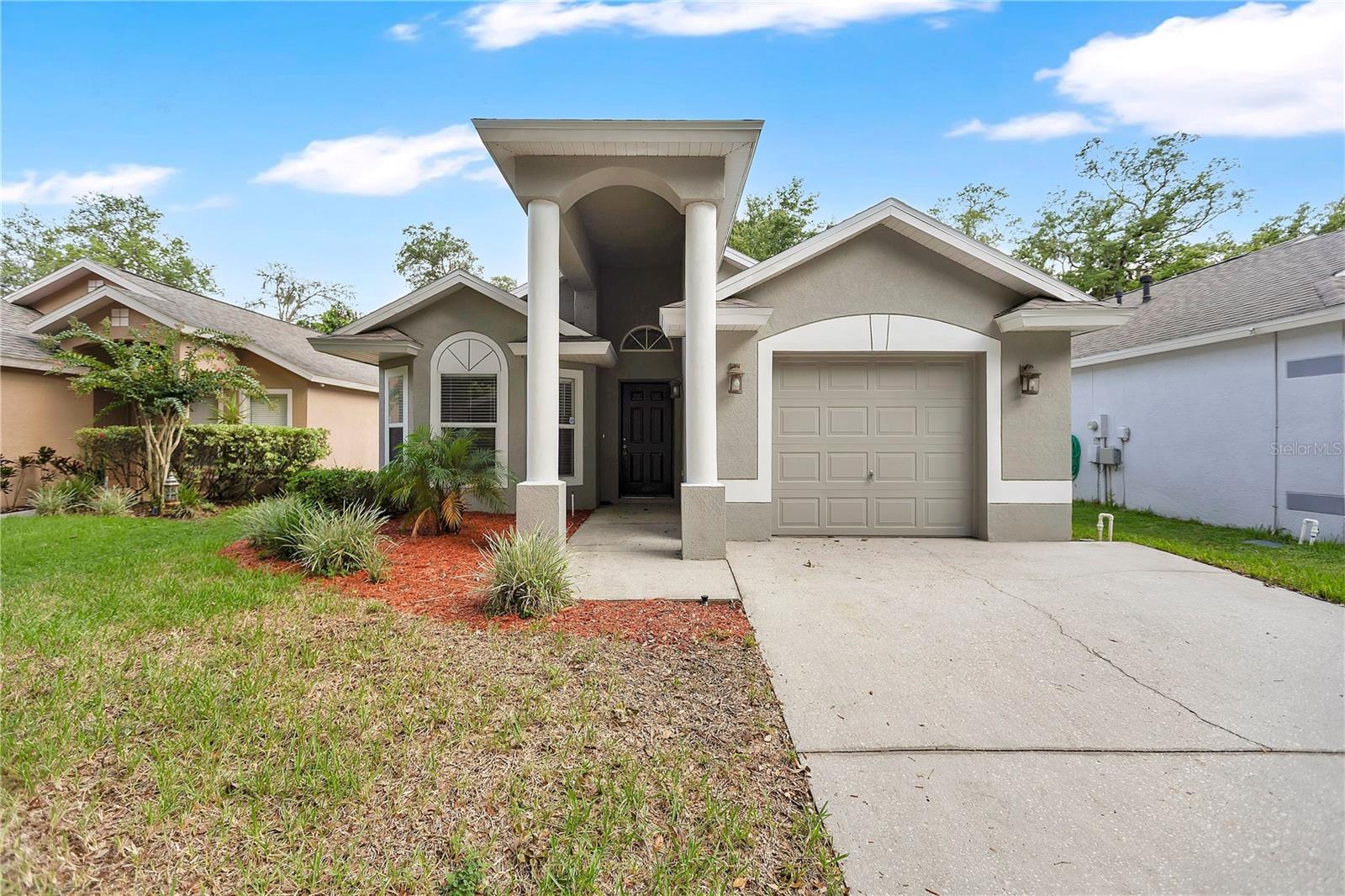 VR tour available. Seller offering up to $13,808 toward buyer closing costs, prepaid expenses, and/or an interest rate buydown. Welcome to FishHawk Ranch, where this move-in ready 3-bedroom, 2-bath home offers 1,497 square feet of well-designed living space with a functional split-bedroom floor plan. Major recent updates include a brand new roof (2026), a new HVAC system (2026), a new stainless steel range, microwave, dishwasher, and garbage disposal, new carpet in the living areas and bedrooms, fresh interior paint, and both bathrooms fully updated with new vanities, granite countertops with undermount sinks, new faucets, mirrors, and light fixtures, plus refreshed shower and tub fixtures. The kitchen offers granite countertops, a stainless undermount sink, ample cabinet and counter space, a pantry, and a breakfast bar, all opening to a spacious living and dining area. A dedicated office near the front of the home provides the perfect space for working from home, a playroom, or a potential fourth bedroom. The private primary suite features a large walk-in closet and an en suite bathroom with dual vanities, a garden tub, and a separate shower, while two additional bedrooms and a full bath sit on the opposite side of the home for added privacy. Outside, a freshly washed exterior and refreshed landscaping with new mulch boost the curb appeal. Complete with an indoor laundry room and a one-car garage, this home is conveniently located near top-rated schools, shopping, dining, parks, and all of the amenities FishHawk Ranch has to offer.