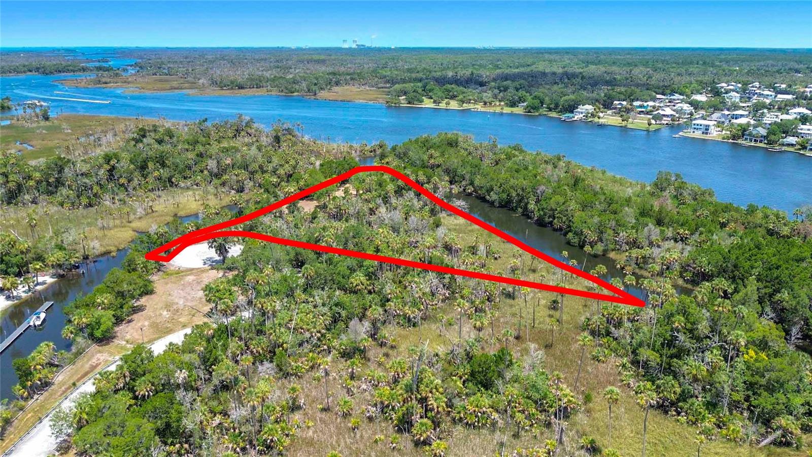 Fall in love with this one-of-a-kind 2.8 acre peninsula lot with so many ways to enjoy it! Quiet and serene, you can relax in the sounds of nature and incredible views from every angle. The 7 mile long estuary of Crystal River waterway is just beyond a land barrier, creating protection and privacy, along with the beautiful mixture of mature trees and foliage. In just 3.8 miles or a 30 minute boat ride, you will arrive in Crystal Bay in one direction; and in about 20 minutes to Three Sisters Springs (popular manatee hangout) in the other. A rare find to also sit on a cul de sac, just off the main road, which provides easy access to the best shops, restaurants and entertainment in the area! Envision your dream home staring over the waterways that lead straight to the Gulf of Mexico, where the fishing is plentiful and the gifts of nature are constant!