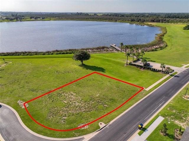 Welcome to 402 Waterfern Trail in Auburndale, FL, located in the prestigious gated community of Water Ridge. This spacious 0.24-acre corner lot offers a fantastic opportunity to build your dream home with picturesque views of both Lake Medora and Lake Van. The lot features approximately 83' x 138' x 85' x 106' of prime land, ideal for creating a custom home that perfectly fits your vision.

Water Ridge is renowned for its resort-style amenities, which include multiple swimming pools (including a lap pool), a clubhouse with a fitness center, tennis courts, scenic walking trails, and on-site boat and RV storage. For those who enjoy outdoor activities, the community offers a boat dock and boat ramp, providing easy access to water sports and lakefront living.

The property is ideally located with easy access to I-4, offering convenient travel to Orlando, Disney Parks, and Tampa, making it a perfect balance of peaceful living and proximity to major attractions and work hubs. 

Don't miss the chance to own a slice of paradise in this beautiful community, where natural beauty and modern conveniences meet. Contact us today to schedule your showing and explore the endless possibilities this property has to offer!