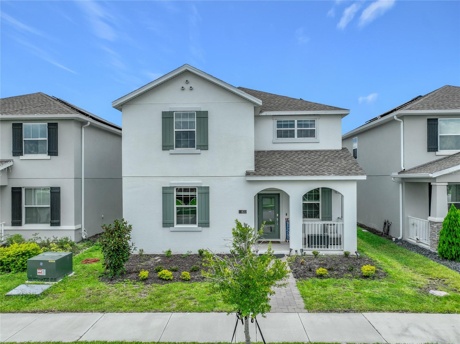 Located in one of Lake Nona's most desirable communities, this charming 2023-built, move-in-ready home at 11835 Boldface Dr now includes a newly converted flex room, creating a true 6-bedroom, 3-bath layout that blends modern comfort, prime location, and extensive community amenities. The exterior features a well-maintained façade and a spacious yard suited for outdoor activities and relaxation, while the interior layout is thoughtfully designed to support both comfort and functionality. Elegant wood-look tile spans the main level, where a flexible floor plan accommodates a wide range of living arrangements. Two full first-floor bedrooms and a bathroom provide valuable convenience for guests, multigenerational living, or use as a home office, den, or playroom.

The kitchen includes quartz countertops and stainless-steel appliances and connects naturally to the dining and family rooms, creating a warm, cohesive central gathering space. Upstairs, a spacious loft complements the master suite, which includes an upgraded walk-in closet and master bath, along with three additional bedrooms and a full bath. The patio extends the living space outdoors, creating a year-round setting for relaxation or entertainment.

This home faces the community's main amenities, providing immediate proximity to a 24/7 gym, clubhouse, resort-style pool, playground, volleyball and basketball courts, and a large multipurpose field suitable for soccer and more outdoor activities. Residents benefit from these features without the responsibility of maintenance. Guest parking is plentiful-an uncommon advantage in many Orlando neighborhoods. In addition to a 2-car garage, the long private driveway accommodates up to four additional vehicles, allowing parking for six cars total on-site.

Energy-efficient components include transferrable leased solar panels that help reduce power costs, along with a hybrid water heater-both contributing to long-term savings and peace of mind. HOA fees include high-speed fiber-optic Spectrum Internet and a full premium TV bundle featuring HBO Max Basic With Ads, Disney and Hulu, ESPN Unlimited, Paramount Essential, Peacock Premium with Ads, FOX One, AMC with Ads, ViX Premium with Ads, plus a complimentary home phone line suitable for home office use.

Storey Park residents also have access to a second gym, an additional pool with splash pad, multiple playgrounds, dog parks, and miles of walking trails. The community hosts weekly classes, events, and family-friendly activities-often featuring free entertainment such as bounce houses, slides & arts and crafts -creating a lively and engaging environment. Facing the clubhouse provides appealing day-and-night views enhanced by seasonal lighting, and the surrounding sidewalks and scenic landscape support enjoyable, safe walks throughout the year.

The home is zoned for top-rated Innovation Middle and Innovation High Schools, with a brand-new elementary school scheduled to open in August 2026. The location provides quick access to Lake Nona Medical City, Orlando International Airport, AdventHealth Hospital, Boxi Park, and major expressways (417 and 528). Orlando's top attractions are within 30 minutes, and Cocoa Beach, Disney, and Universal are a short drive away. Storey Park combines convenience, comfort, and community, creating a standout living experience in the heart of Lake Nona.
