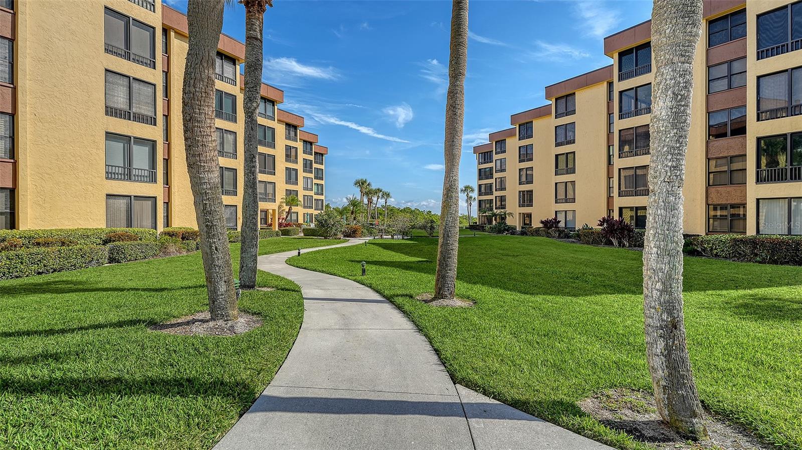 A rare top floor opportunity in a quiet corner of Island Reef. Stunning views of Little Sarasota Bay and the Gulf from the always-shaded lanai or balcony where sunrises and sunsets are easily visible this time of year. Renovated from top to bottom, this is one of the few units with "Impact Glass" already installed in the lanai. This is a true turn-key opportunity allows you to move in immediately and start enjoying this little corner of paradise. Kitchen features granite countertops, and the unit includes an in-residence laundry. Furnished and complete with a carport! Island Reef is a serene waterfront community, and one of the few Gulf-to-Bay communities that offers many desirable amenities including a beach, boat docks (lifts allowed), two lit tennis courts, pickleball, two fitness rooms, kayak storage, a library, billiards, a game room, a clubhouse, two heated pools and gas grills. Pet friendly! Tropical gardens enhance the appeal of Island Reef and this wonderful community, conveniently located near two of Siesta Key's popular restaurants. A complimentary trolley provides access to Siesta beach, Siesta Village offering dining, shopping, ice cream, mini donuts, cute brunch spots, dancing, and live music every night of the week.