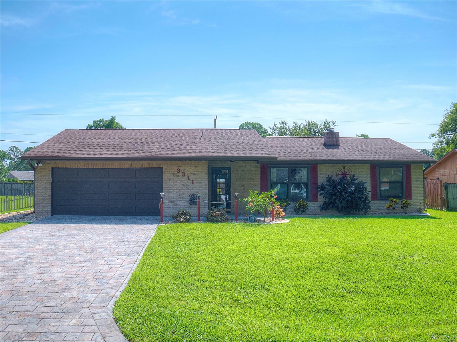 You’ll love this one!  It’s a dazzling  pool home on a quiet street in Florida Shores. Open and bright, this lovely home is well maintained and beautifully updated. Gorgeous wood look ceramic tile embellishes the main living areas, the living room is accented with a cozy wood burning fireplace and the kitchen is truly impressive. Quartz counters, custom cabinets, stainless steel appliances, a huge skylight and the breakfast bar are some of its shining features. The Florida room overlooks the brilliant pool area, the lighted and landscaped backyard and a coastal Smith-built anchored shed. This home boasts more than beauty though: an integrated generator hookup, impact windows throughout, a hurricane-impact rated garage door and shutters for the Florida room make for some smart features! Bring your surfboard, fishing rods, kayaks and canoe because you're close to world-class fishing on the Indian River Lagoon and the beautiful coastline of New Smyrna Beach. Hurry!