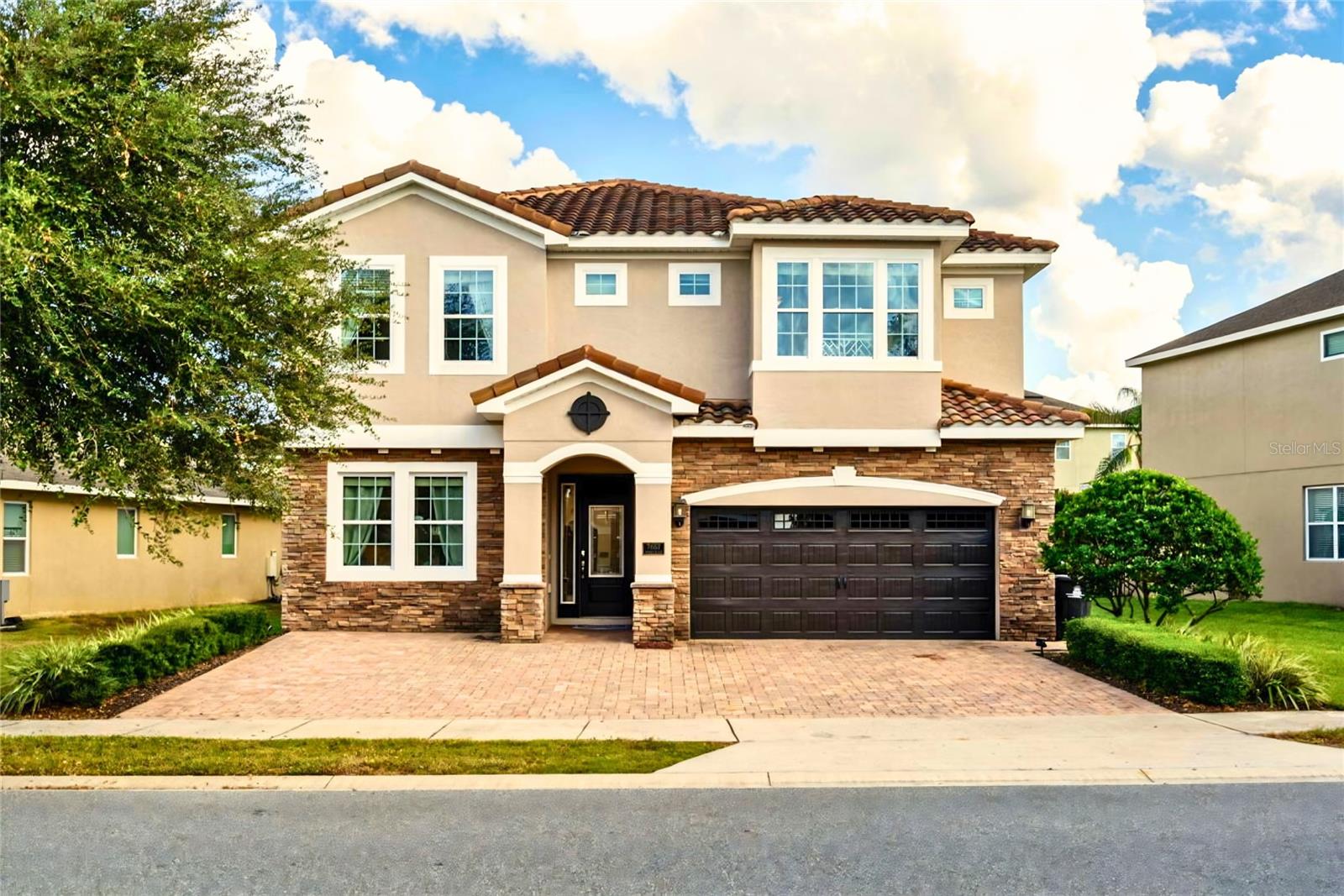 Step into the Disney-area investment opportunity you’ve been waiting for: an 11 BEDROOM, 10 BATHROOM LUXURY VACATION RETREAT in amenity-rich Encore at Reunion, designed to deliver unforgettable guest experiences, room for everyone, and the rental potential investors want. Perfectly located just MINUTES FROM WALT DISNEY WORLD and Orlando’s world-famous theme parks, this frequently booked home is ideal as a personal vacation retreat, large-group rental property, or rare home that can help pay for itself.
With a MOTIVATED SELLER and AGGRESSIVE PRICING, this fully furnished investment home offers the scale, features, and location that stand out in Orlando’s vacation rental market. The property has potential for UP TO $120K IN ANNUAL INCOME. Its bedroom count, ensuite-heavy layout, themed entertainment, quality furnishings, and proximity to DISNEY, UNIVERSAL & SEAWORLD, create the kind of large-group appeal that drives bookings.
Designed for large groups and multi-generational travel, the home features 11 BEDROOMS, 10 FULL BATHROOMS, 9 BEDROOMS WITH FULL ENSUITES, and THREE PRIMARY SUITES, with two downstairs and one upstairs for flexibility and privacy. The ADDED 11TH BEDROOM further enhances rental capacity, while the spacious layout comfortably accommodates large vacation groups.
From the moment you arrive, the home delivers strong curb appeal with a SPANISH TILE ROOF, STONE FACADE, and BRICK PAVER DRIVEWAY. Inside, it is sold FULLY FURNISHED with quality furnishings & COMPLETELY TURNKEY, allowing the next owner to step directly into ownership with minimal setup.
The AIR-CONDITIONED STAR WARS THEMED GAME ROOM impresses with immersive murals and professional-level games including TWO NASCAR ARCADE DRIVING GAMES, POP-A-SHOT BASKETBALL, AIR HOCKEY, PING PONG, and FOOSBALL. Additional themed spaces include MICKEY MOUSE AND STAR WARS THEMED BEDROOMS, creating the memorable vacation experience guests want!
The large gourmet kitchen is built for high-use vacation rental living w/GRANITE COUNTERS, 42” SHAKER-STYLE CABINETS, a TILED ISLAND FOR DURABILITY, TWO STAINLESS STEEL REFRIGERATORS, TWO STAINLESS STEEL DISHWASHERS, a coffee/wine bar, and fully stocked kitchen. The home also features upgraded bathrooms with GRANITE COUNTERS and GLASS-ENCLOSED SHOWERS, ceiling fans throughout, large storage closets, owner’s storage, TANKLESS WATER HEATERS, and TWO A/C UNITS.
Recent upgrades add peace of mind and enhance the guest experience, including a NEW POOL HEATER, NEWER A/C, upgraded lighting, refreshed decor, stylish fixture updates, and the ADDED 11TH BEDROOM.
Step outside to a private resort-style backyard with a HEATED POOL, HEATED HOT TUB, large covered lanai, expansive paver outdoor space, fenced backyard, and tropical landscaping. This outdoor space offers the private retreat expected from a luxury Orlando vacation home.
Located just a 5-MIN WALK TO ENCORE CLUB AMENITIES, enjoy the Encore waterpark, pools, clubhouse, restaurant and bar, fitness center, game room, courts, soccer fields, and available concierge services, park shuttles.
The HOA helps simplify ownership with access to Reunion amenities, security, 24-HOUR MANNED GATED ENTRY, internet, cable, landscaping, irrigation, daily valet trash, pest control, and community grounds maintenance.
Whether you are searching for a large Disney-area vacation home or fully turnkey short-term rental this home offers the best of both worlds. Schedule your private showing today before it is gone!