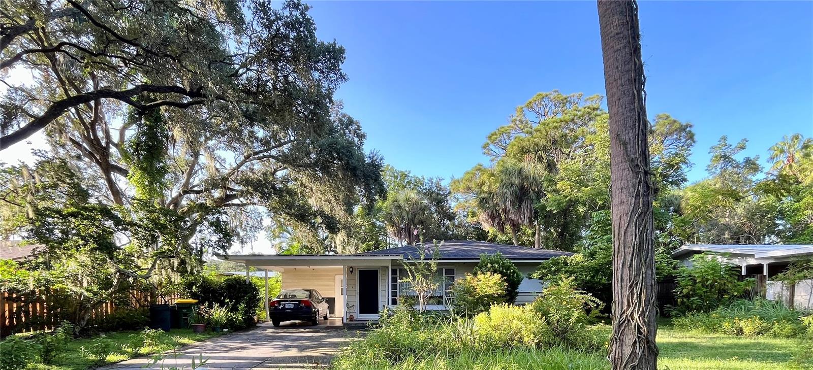Million Dollar neighborhood. Attention Investors or Handyman! Great LOCATION on peaceful, DEAD END STREET, walkable to beautiful Arlington Park with its trails, dog park and playground. Within city limits, close to downtown shopping and restaurants, beaches,  and St Armands Circle, yet peacefully hidden from traffic and busyness. Perfect place for familiy home, build the home of your dreams. Home presently needs TLC. Property could be landscaped to become a peaceful haven with pool and spa in back.