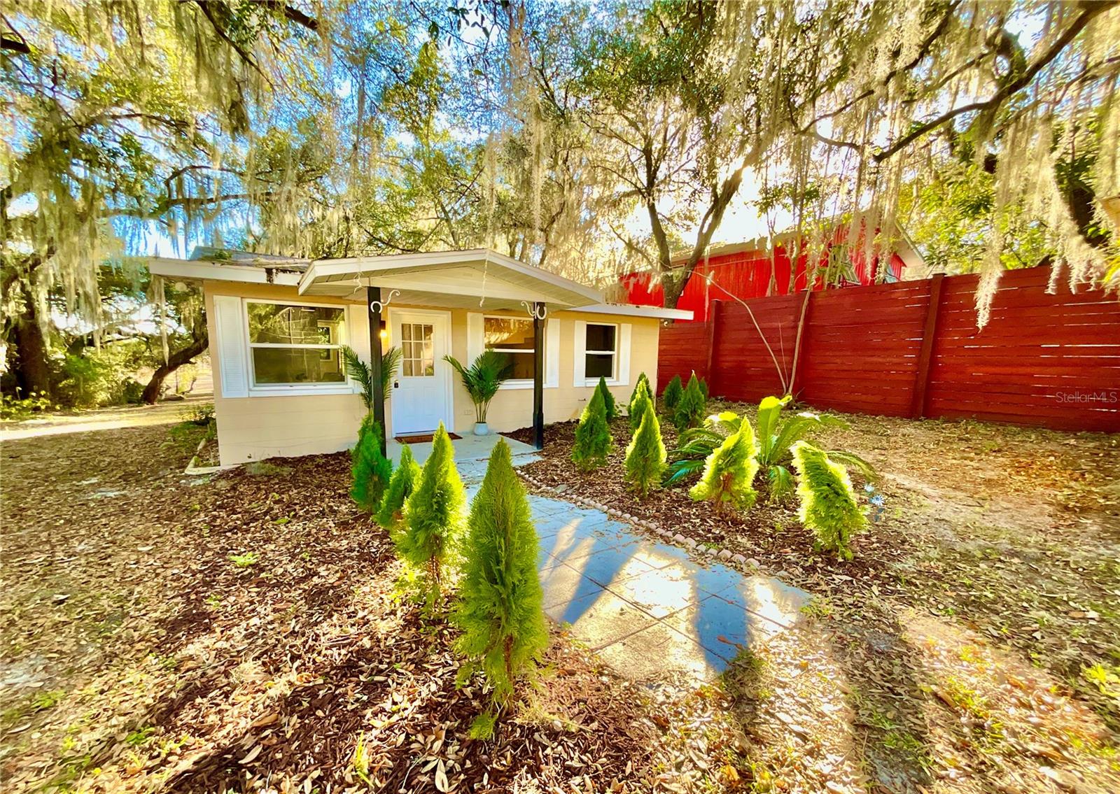 Fully renovated 2 bedroom, 2 bathroom waterfront lake home on 1.5 acres, offered fully furnished and designed for comfort, style, and long-term peace of mind. This rare Melrose lakefront property has been extensively remodeled, with all major and costly systems already replaced—making it truly move-in ready. Professionally renovated by Iron House Florida, LLC, a local Central Florida investor. Upgrades include a new plumbing system, new well pump, pressure tank, and new pool pump, with a new roof to be installed prior to closing. The interior has been thoughtfully updated and features a fully remodeled kitchen with quartz countertops, stainless steel appliances, and modern finishes throughout. Spa-style bathrooms, fresh interior and exterior paint, abundant natural light, and a large inside laundry room complete the polished living space. Outside, enjoy the screened inground pool and expansive lakeside lot with plenty of room for an RV, boat, work vehicles, gardening, or a future workshop. Three storage sheds provide added storage and flexibility. Located on a quiet street with no HOA, and conveniently commutable to Orange Park, Gainesville, and Palatka. A rare opportunity to own a fully upgraded, furnished lakefront retreat.