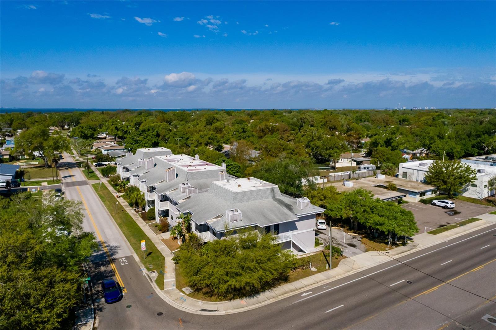 Tiffany Suites South Tampa — Unit 21 | First-Floor Prime Unit! Welcome to Unit 21 at Tiffany Suites Condominium in South Tampa, a desirable first-floor 2-bedroom, 1-bath residence ideally positioned just minutes from Bayshore Boulevard, Hyde Park, Downtown, and some of Tampa Bay’s premier dining, shopping, and nightlife—offering both convenience and lifestyle. The thoughtfully designed layout offers a seamless flow between living spaces, with windows that invite abundant natural light, creating a bright and comfortable living environment. Freshly painted and move-in ready, the interior presents a clean, timeless aesthetic throughout. The living area showcases a wood-burning fireplace and is enhanced by wood-look tile flooring and a decorative faux brick accent wall, adding warmth and character. The kitchen features granite countertops, stainless steel appliances, ample cabinetry, and a breakfast bar—ideal for both everyday living and entertaining. The primary bedroom includes a versatile sitting area well-suited for a lounge, reading nook, or flex space, along with generous storage. The second bedroom doubles as a home office, and more. Interior laundry provides added convenience, a valuable feature in condo living. The water heater is newer (2022) as well as a newer AC (2021), providing peace of mind and efficiency. Condo fee includes flood insurance, master insurance policy, water, sewer, trash, landscaping, pest control, and exterior building maintenance. An assigned parking space is conveniently located just outside the unit! This is a rare opportunity to own a 2-bedroom condo in the highly sought-after Tiffany Suites, offering a bright, move-in ready interior in one of South Tampa’s most desirable locations. Schedule your showing today!
