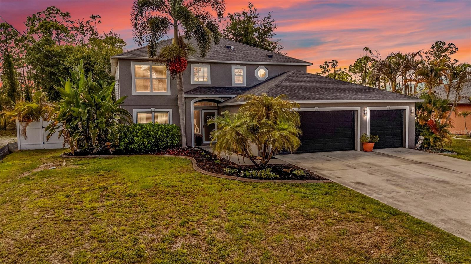 WELCOME TO YOUR PRIVATE FLORIDA OASIS! This beautifully upgraded two-story home offers the ultimate FLORIDA LIFESTYLE with space, privacy, and resort-style amenities throughout. Featuring 4 bedrooms, 2.5 bathrooms, a large den/flex room, 3 CAR GARAGE, and an oversized driveway with room for additional parking and even boat storage, this home is designed for both everyday living and entertaining.

Step inside to a thoughtfully designed layout filled with comfort and functionality. The CHARMING kitchen is truly the heart of the home, featuring Frigidaire Professional Series stainless-steel appliances installed within the last 2–3 years, a butcher block island, built-in wine chiller, newer deep single-basin sink with high-powered garbage disposal, DOUBLE PANTRY storage, breakfast nook, and a formal dining room perfect for hosting family and friends. Hidden storage throughout the home, including an impressive under-staircase storage area, provides incredible convenience for seasonal items and extra belongings.

The spacious primary suite serves as a luxurious retreat with HIS & HER CLOSETS leading into the UPDATED SPA-LIKE BATHROOM showcasing stone flooring, FIVE SHOWERHEADS, LED LIGHTS, and modern finishes designed for ultimate relaxation. Additional bathrooms have also been tastefully updated with new vanities and clean contemporary touches. The home is wired for surround sound with built-in speakers, creating the perfect atmosphere for entertaining or relaxing at home.

Step outside and experience your own backyard paradise. The large HEATED POOL AND SPA with BEACH ENTRY creates a true resort feel, while the covered side porch, outdoor shower, hot tub, and cozy fire pit make outdoor living unforgettable. Backing onto a peaceful greenbelt with PRIVACY FENCE on both sides, this property offers exceptional privacy where neighbors cannot see into the pool deck area. Whether you are entertaining guests, enjoying family time, or simply unwinding after a long day, this outdoor space was designed to impress.

Additional highlights include a 2023 ROOF, NEWER AC, NO HOA, and NO DEED RESTRICTIONS. Conveniently located less than 10 minutes from shopping, restaurants, grocery stores, medical facilities, and more, this home truly combines luxury, comfort, privacy, and convenience in one incredible package. Perfect for a growing family, AIRBNB opportunity, or investment property, OR ENTERTAINING friends and family.

Set your appointment today — this is the FLORIDA DREAM HOME you have been waiting for!