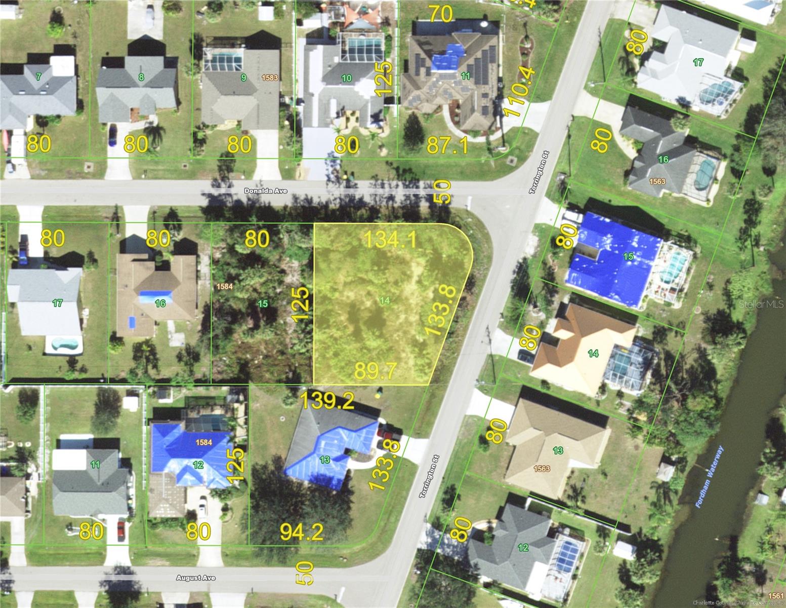 This is an extra special oversized corner lot in the ever-popular Section 15 boasting a wonderfully convenient location just minutes to Peachland Promenades with lots of shopping and many restaurants to please any preference and another few minutes will bring you to the I-75 entrance. Another nearby amenity is the Harold Avenue Recreation Center, a popular spot for sports enthusiasts. Section 15 offers an area of beautiful homes with the advantage of offering both CITY WATER and SEWER. Boasting almost a third of an acre, this is a rare opportunity to find such an attractive property with so much space for your Florida dream home.